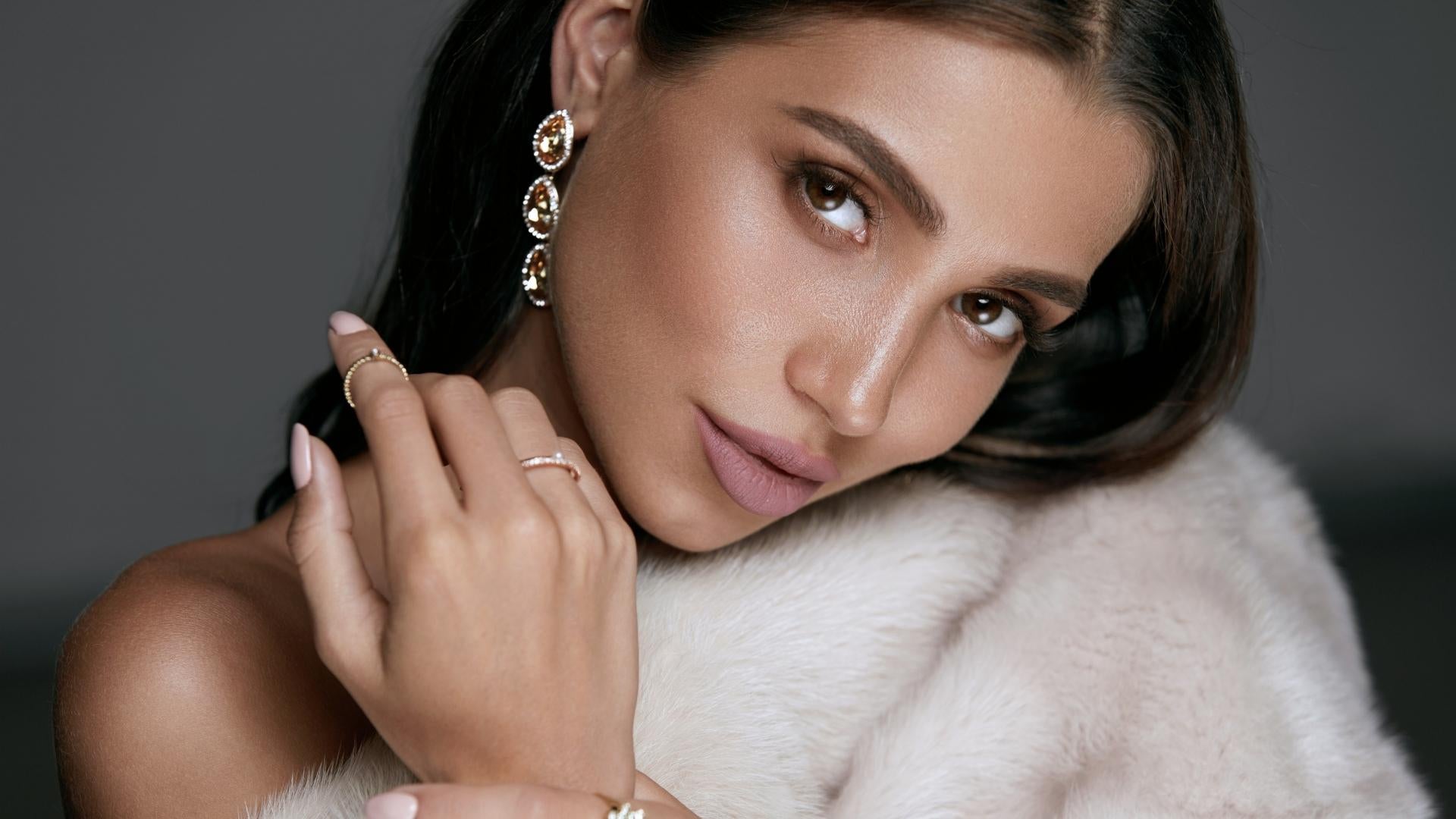 Woman wearing beautiful custom jewelry