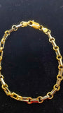 Bracelet en or bicolore avec maillons trombone et rolo