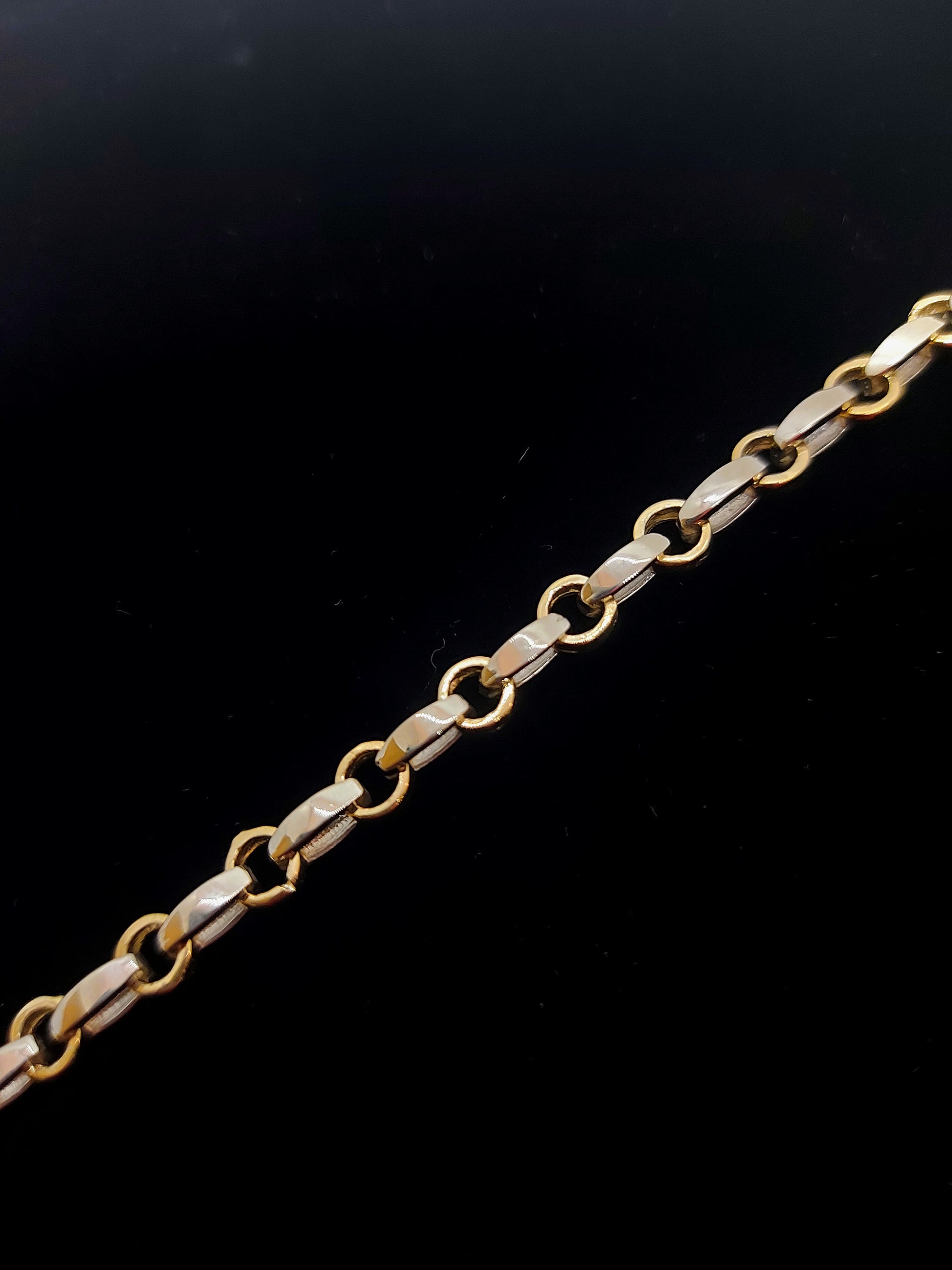 Gold two tone Rolo link and Oval link bracelet