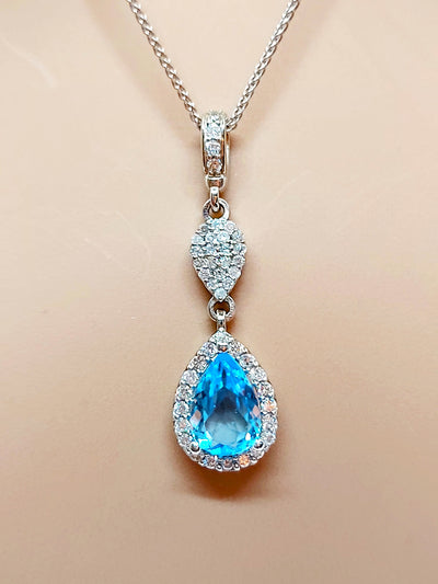 14k Pear Blue Topaz Necklace with diamonds