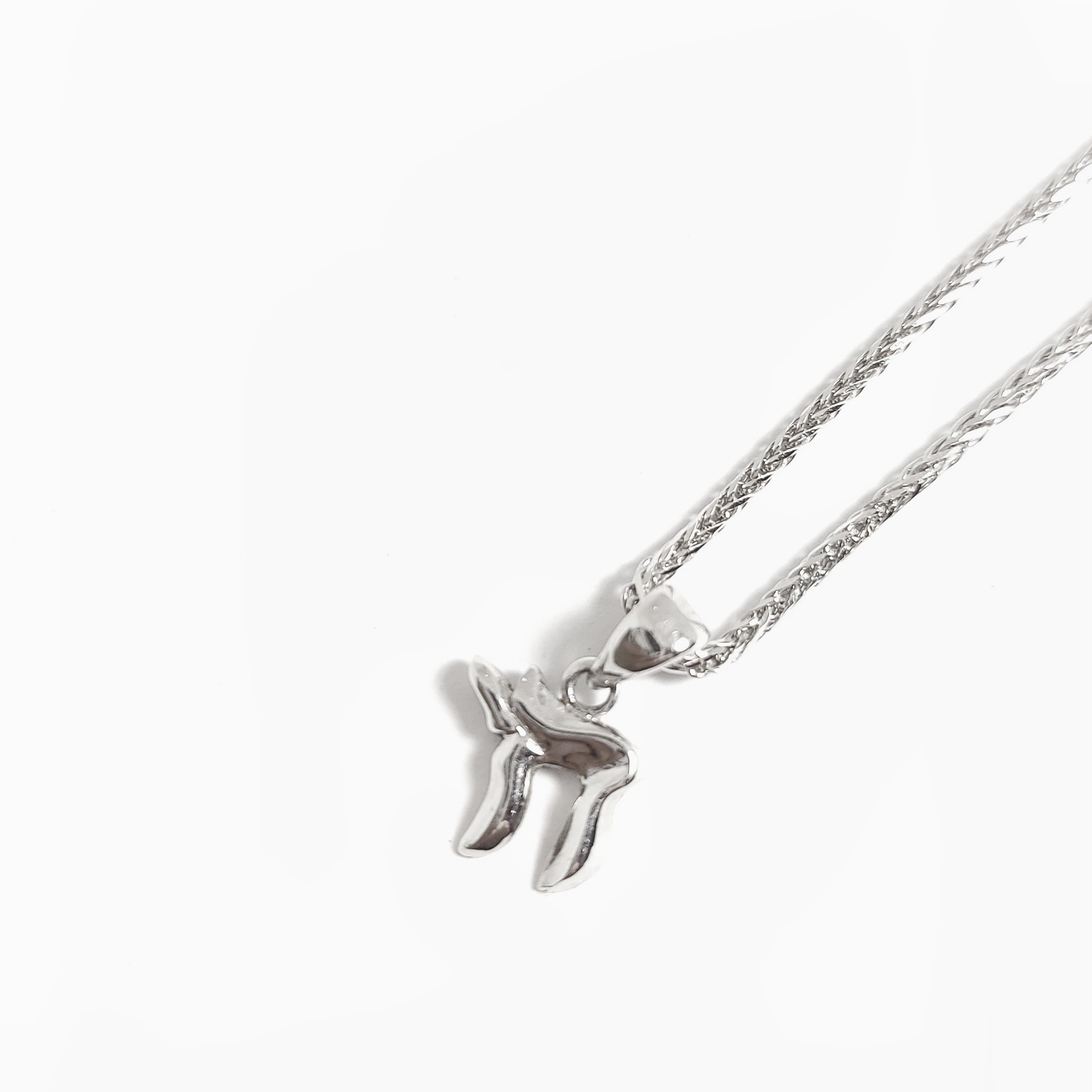 Pendentif en or blanc 14 carats