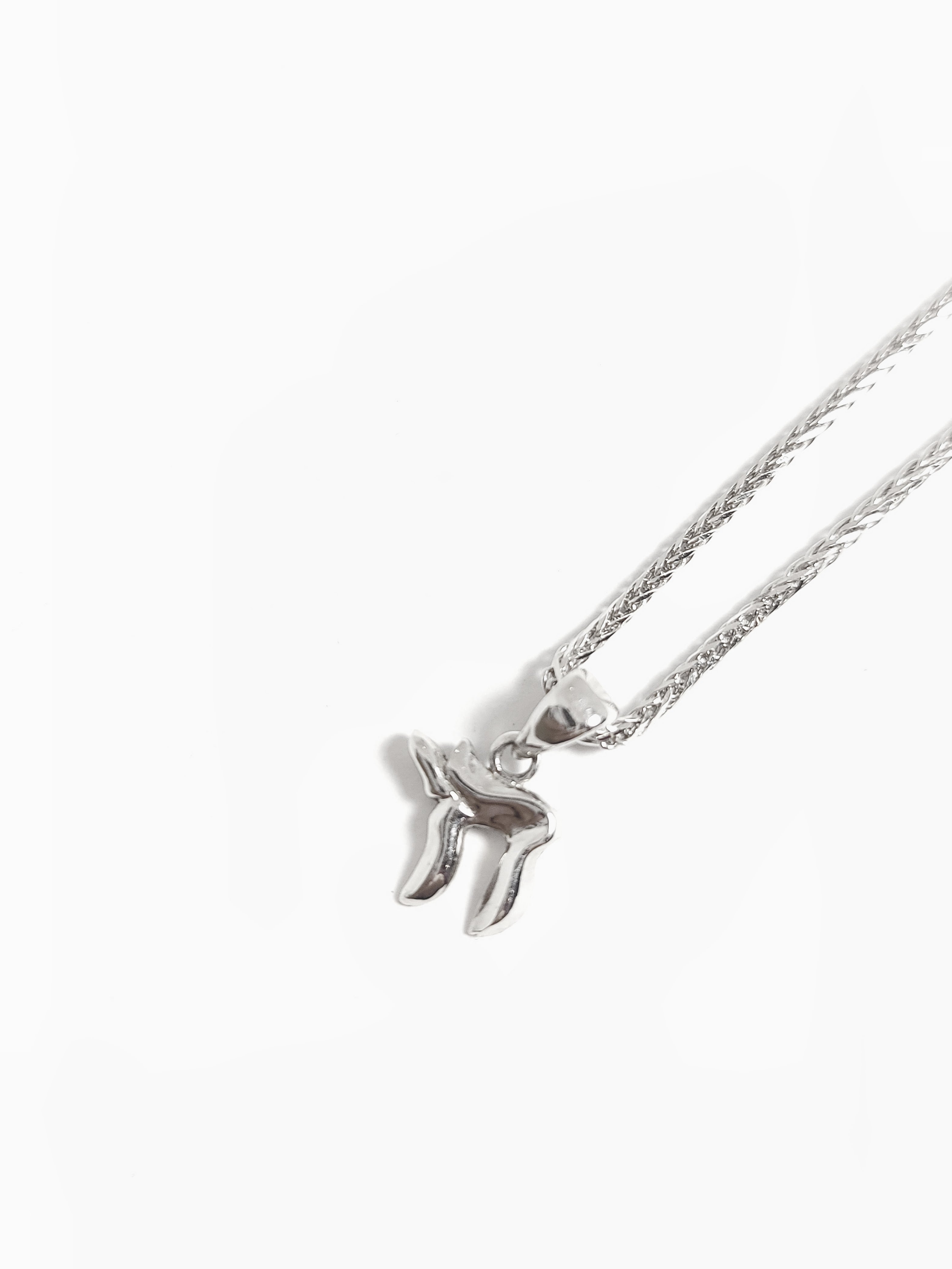 Pendentif en or blanc 14 carats