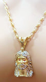 Pendentif tête de Jésus en or avec yeux en rubis