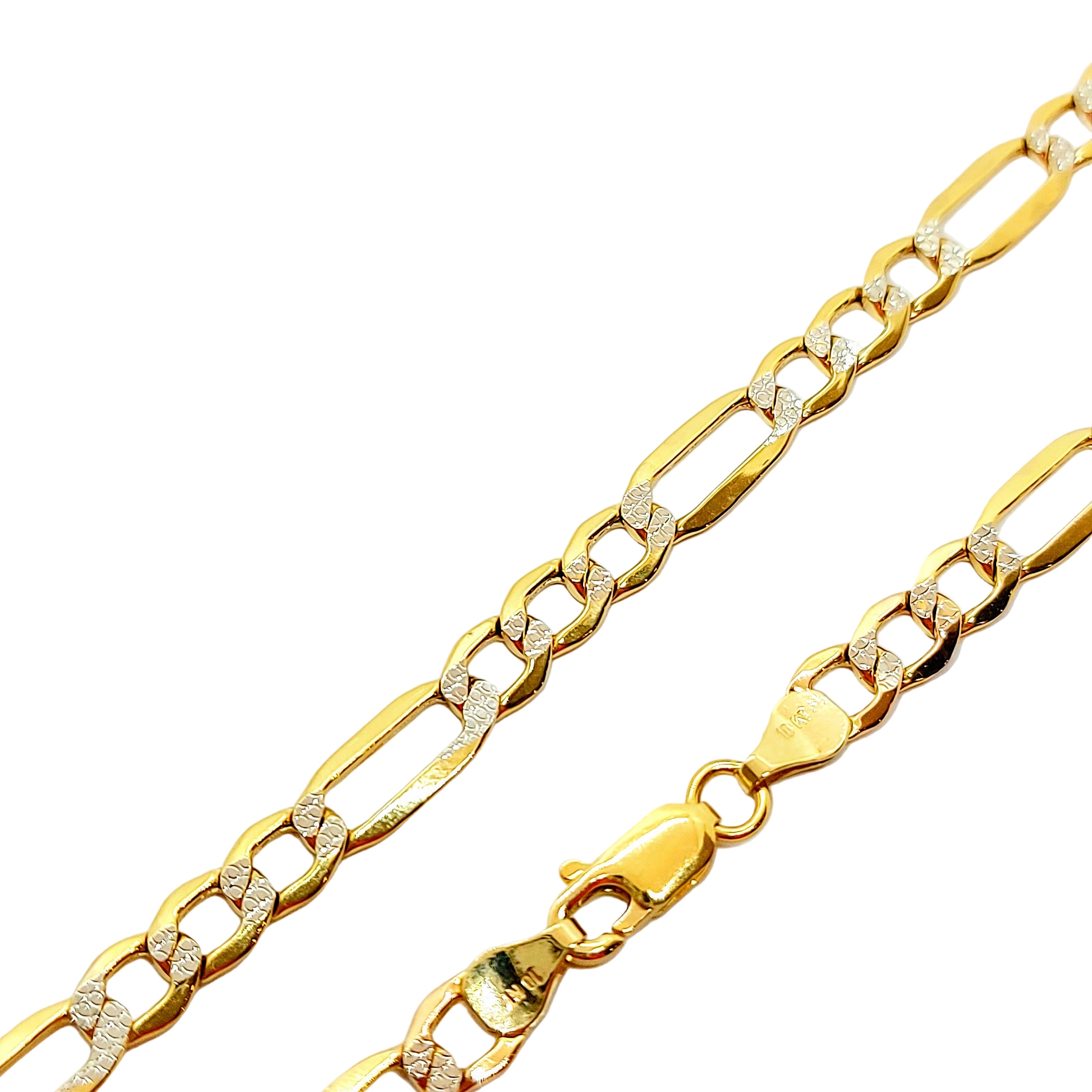 A 10k gold Figaro diamond cut chain with inset stones, displayed against a white background.