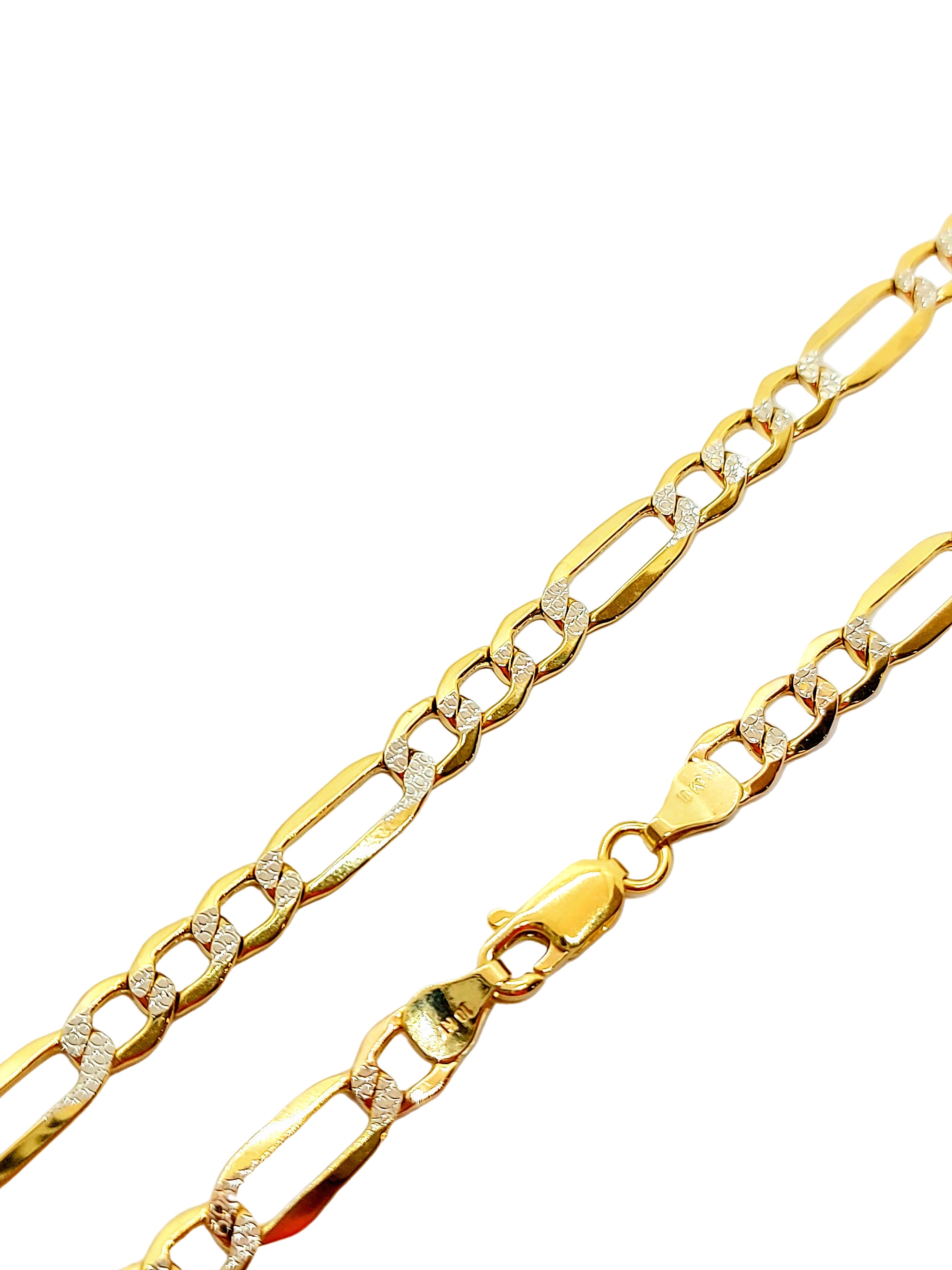A 10k gold Figaro diamond cut chain with inset stones, displayed against a white background.