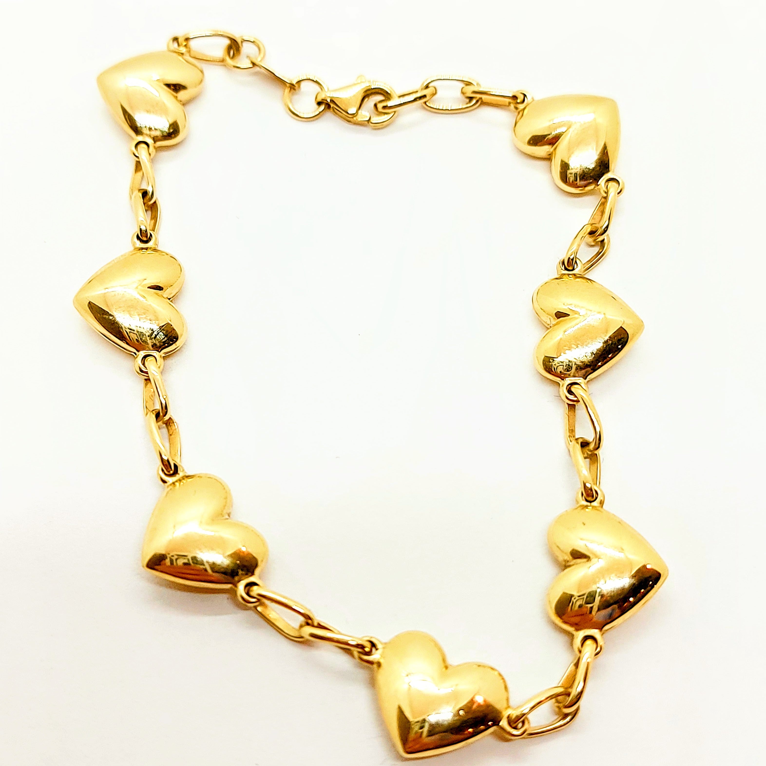 Bracelet en or 10 carats avec cœurs