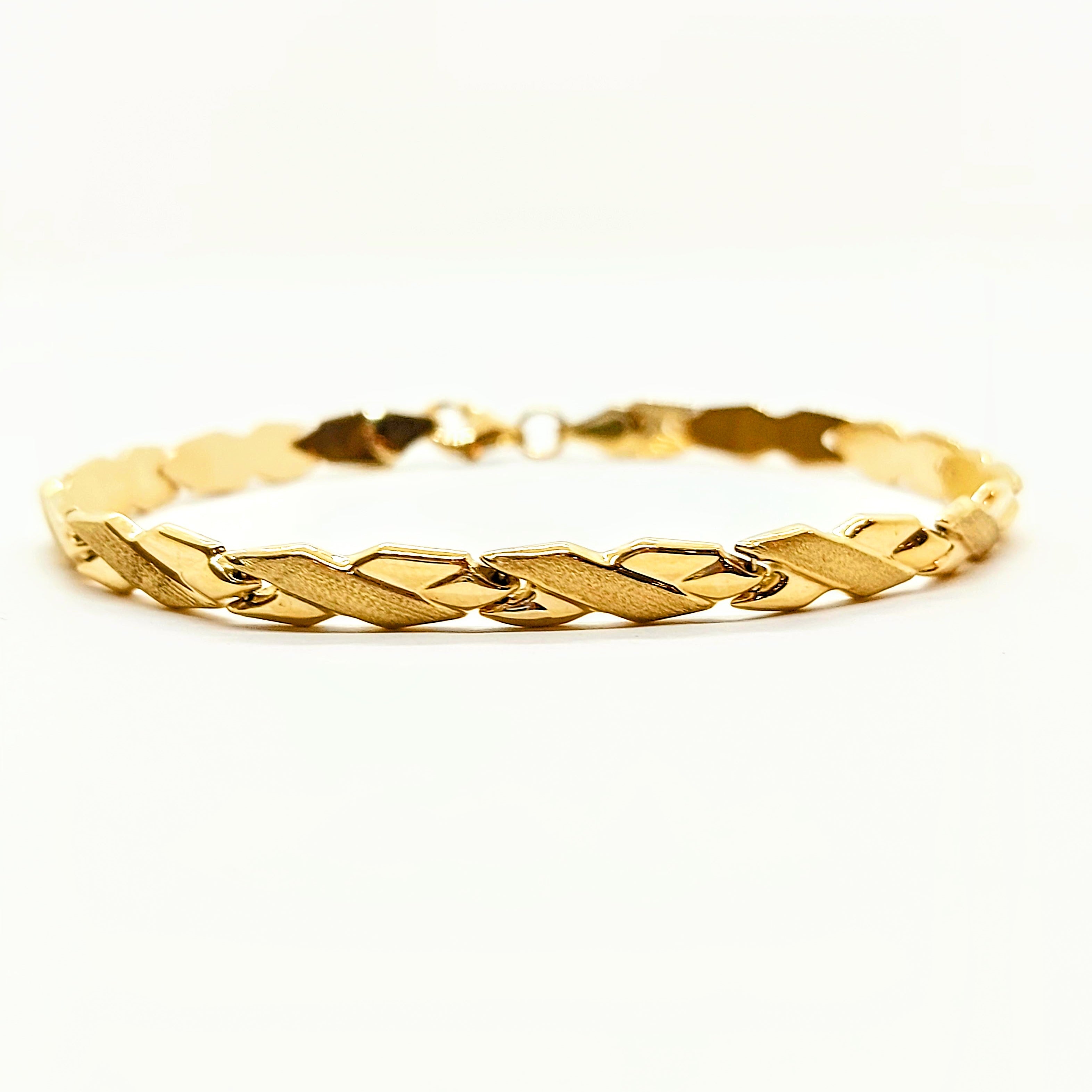 Bracelet en or 10 carats motif X