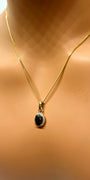 Collier fin en or 10 carats avec saphir