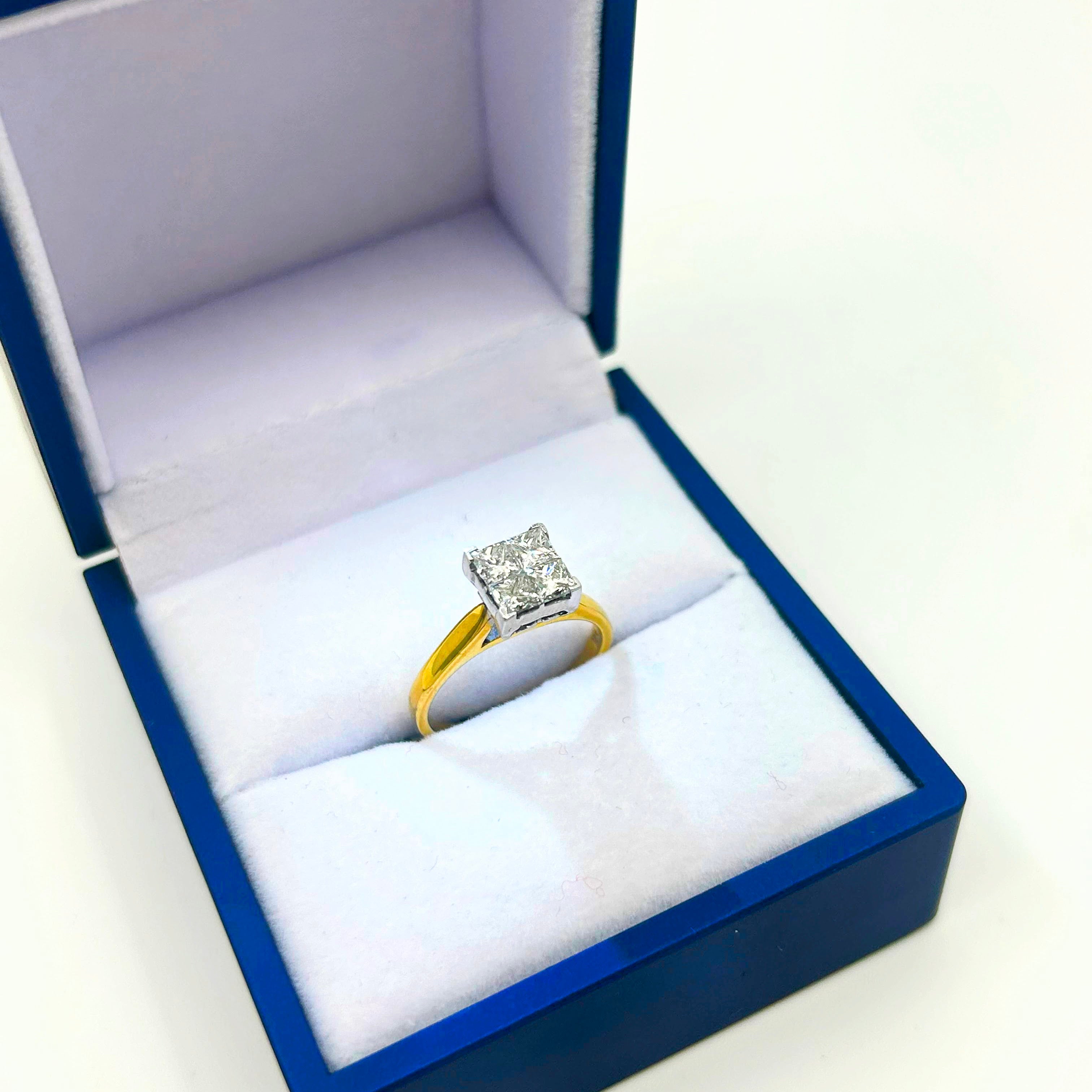 18k Gold Engagement Ring with 1ct VS1 clarity princess cut diamonds