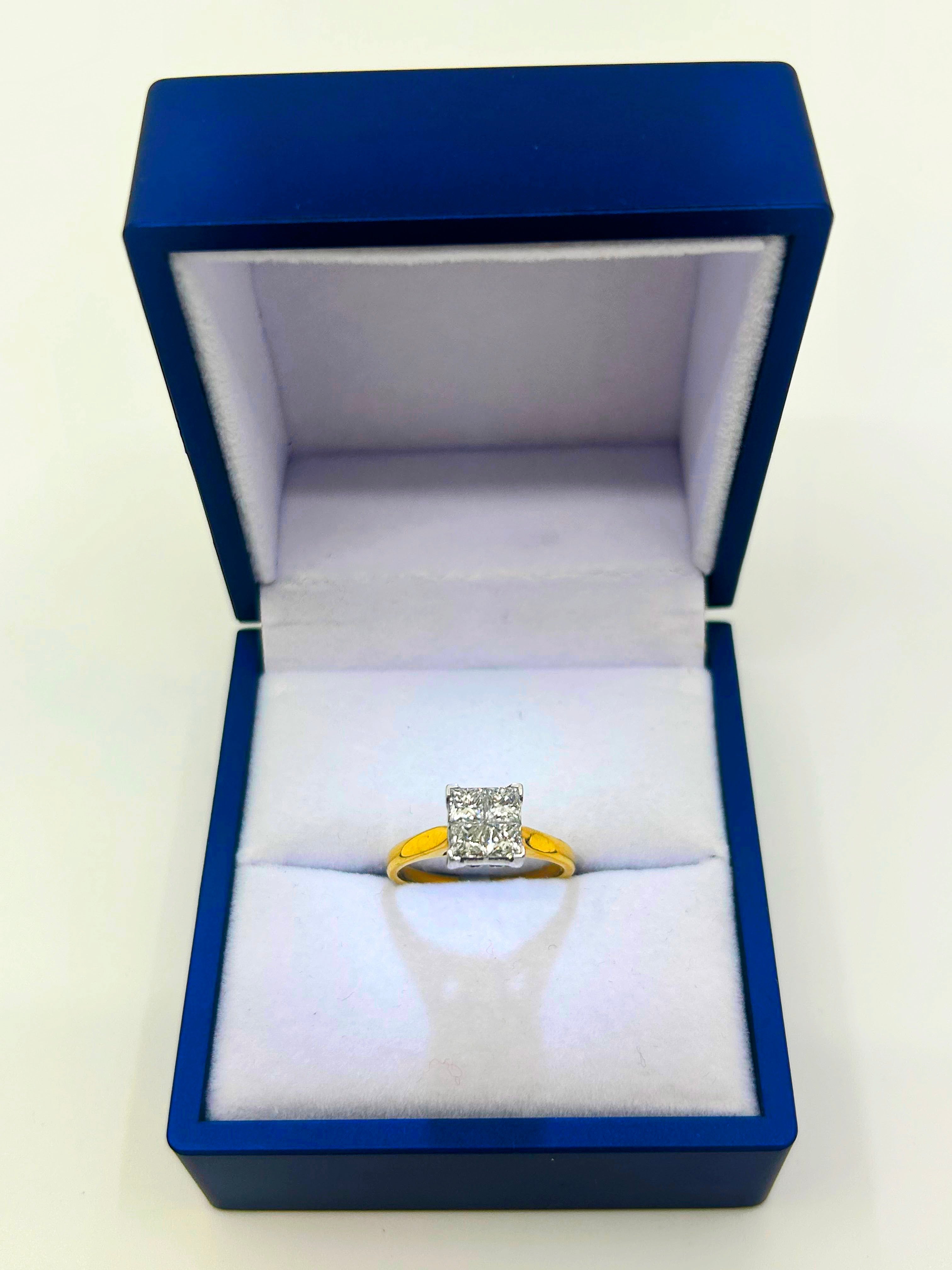18k Gold Engagement Ring with 1ct VS1 clarity princess cut diamonds