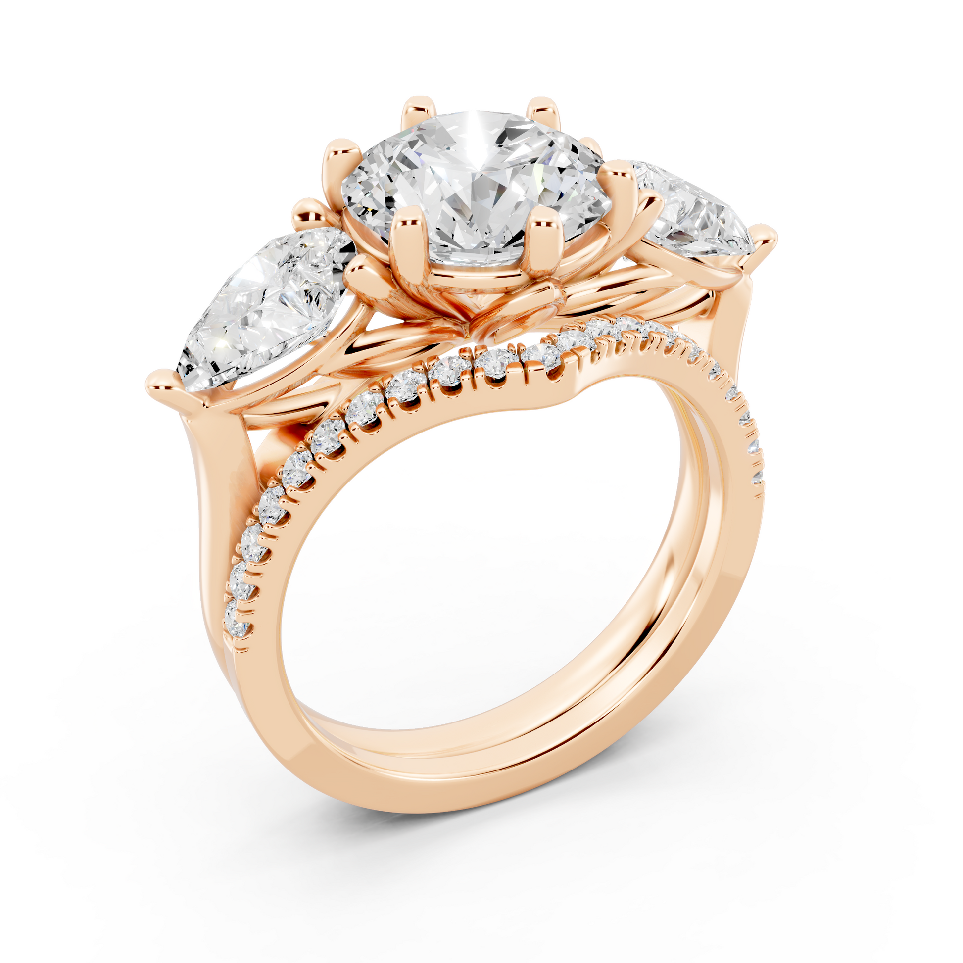 Three stone Ring with Pear shape sides and matching wedding ring.