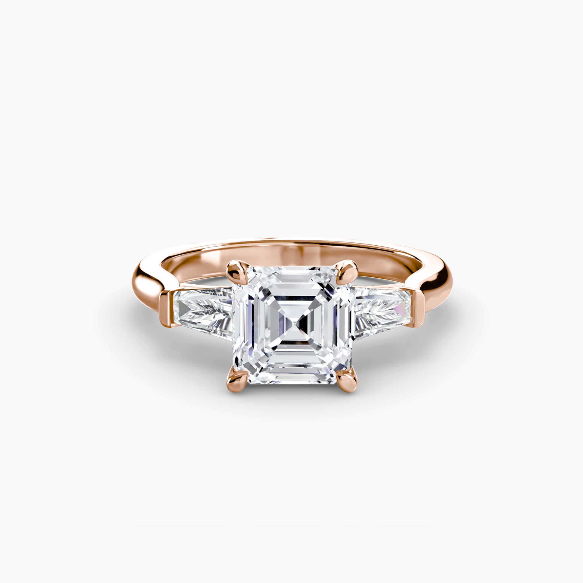 Bague trilogie (pierres latérales baguette)