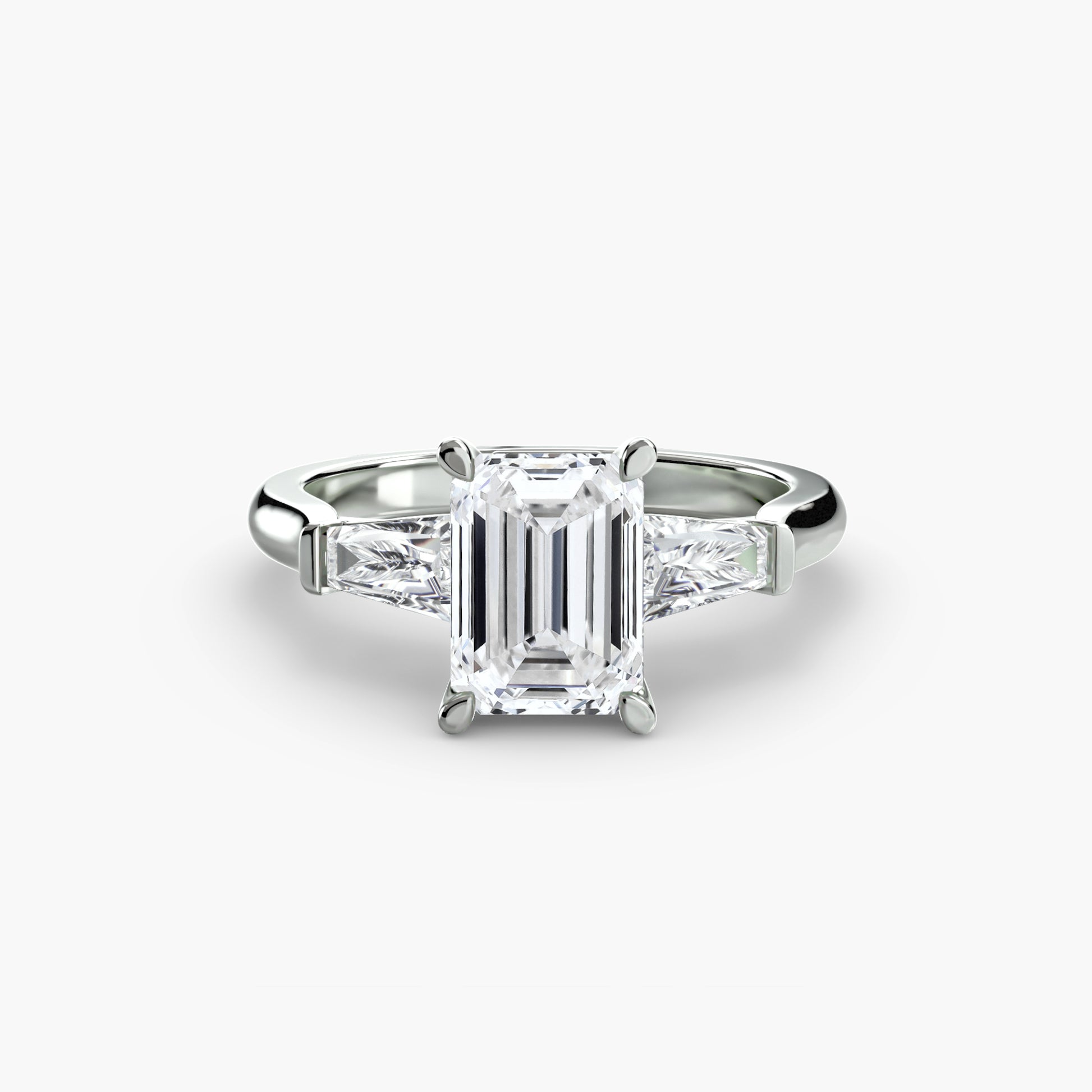 Bague trilogie (pierres latérales baguette)