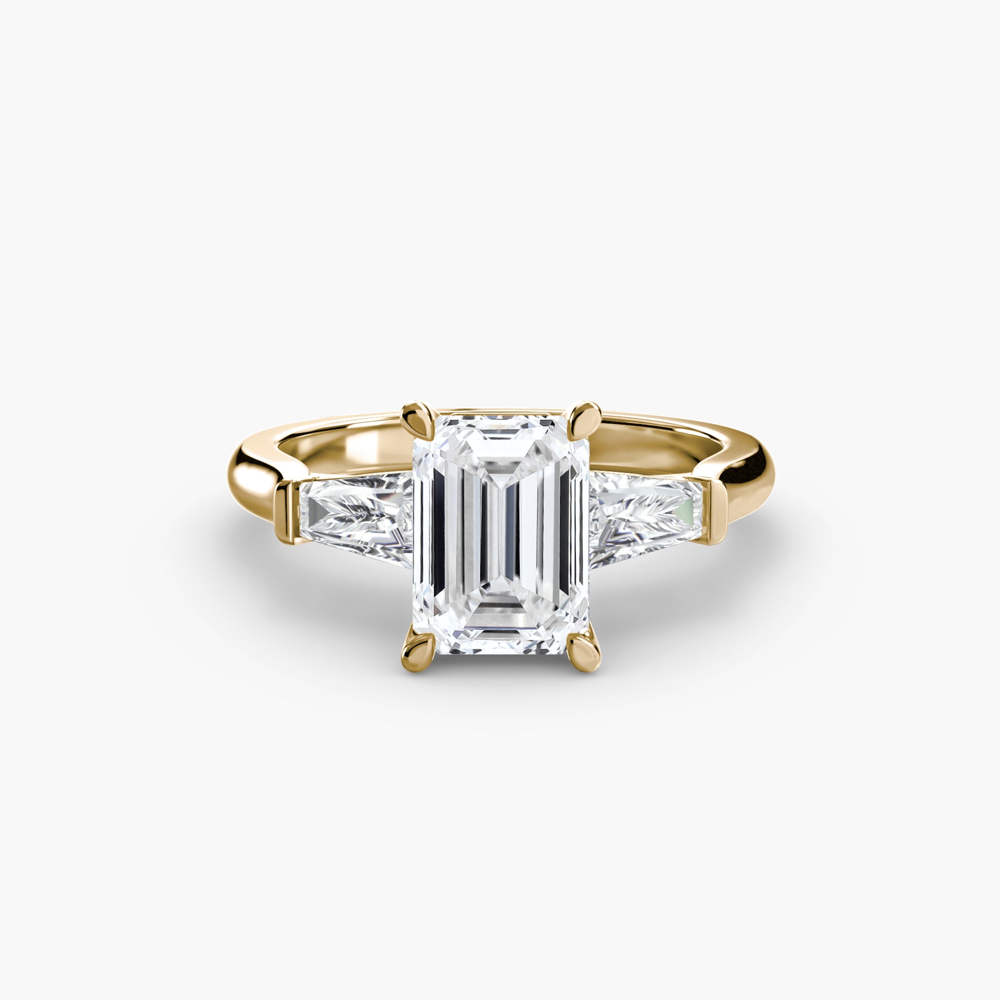 Bague trilogie (pierres latérales baguette)
