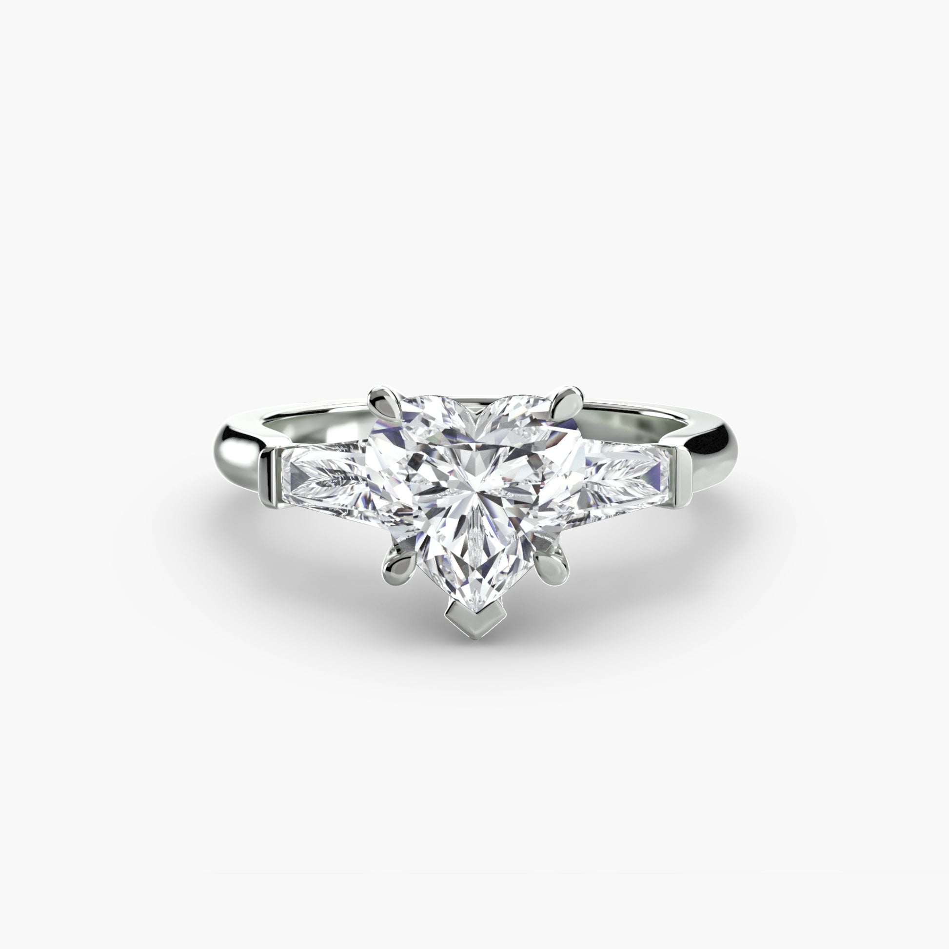 Bague trilogie (pierres latérales baguette)
