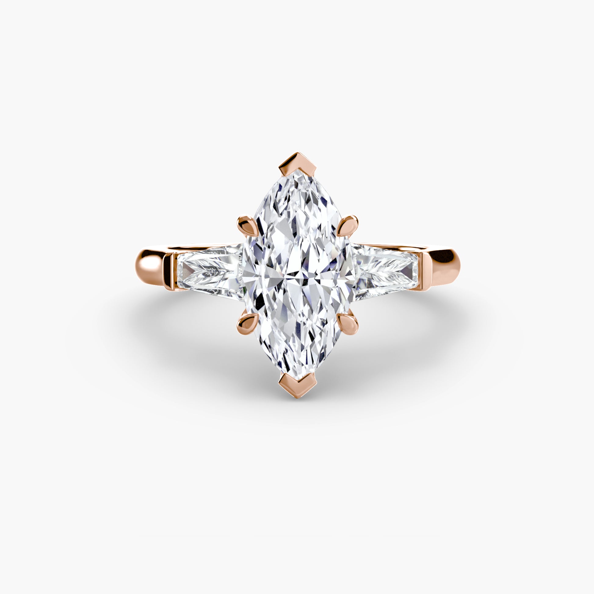 Bague trilogie (pierres latérales baguette)