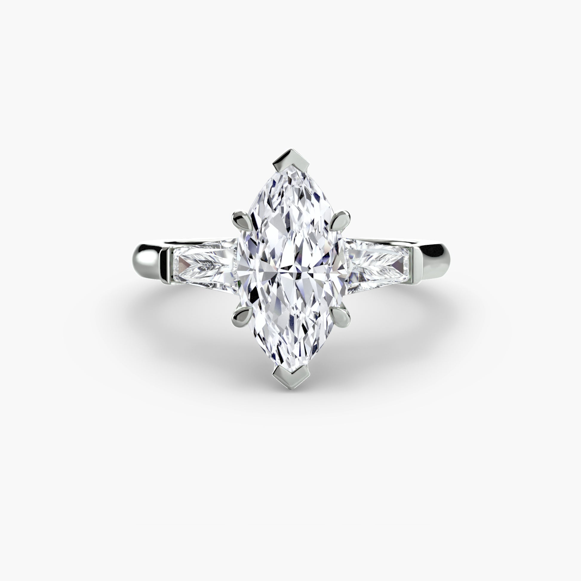 Bague trilogie (pierres latérales baguette)