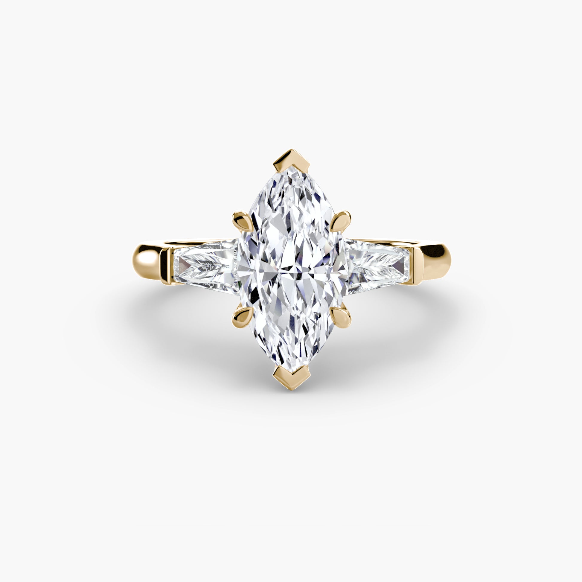 Bague trilogie (pierres latérales baguette)