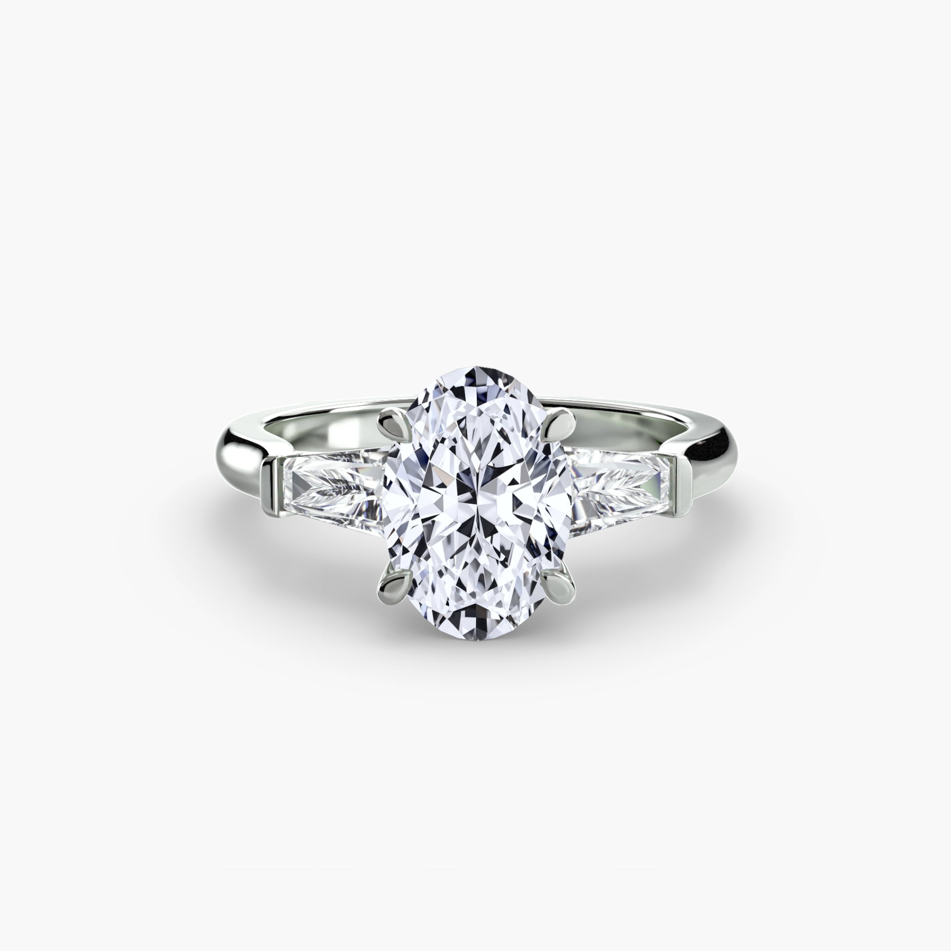 Bague trilogie (pierres latérales baguette)