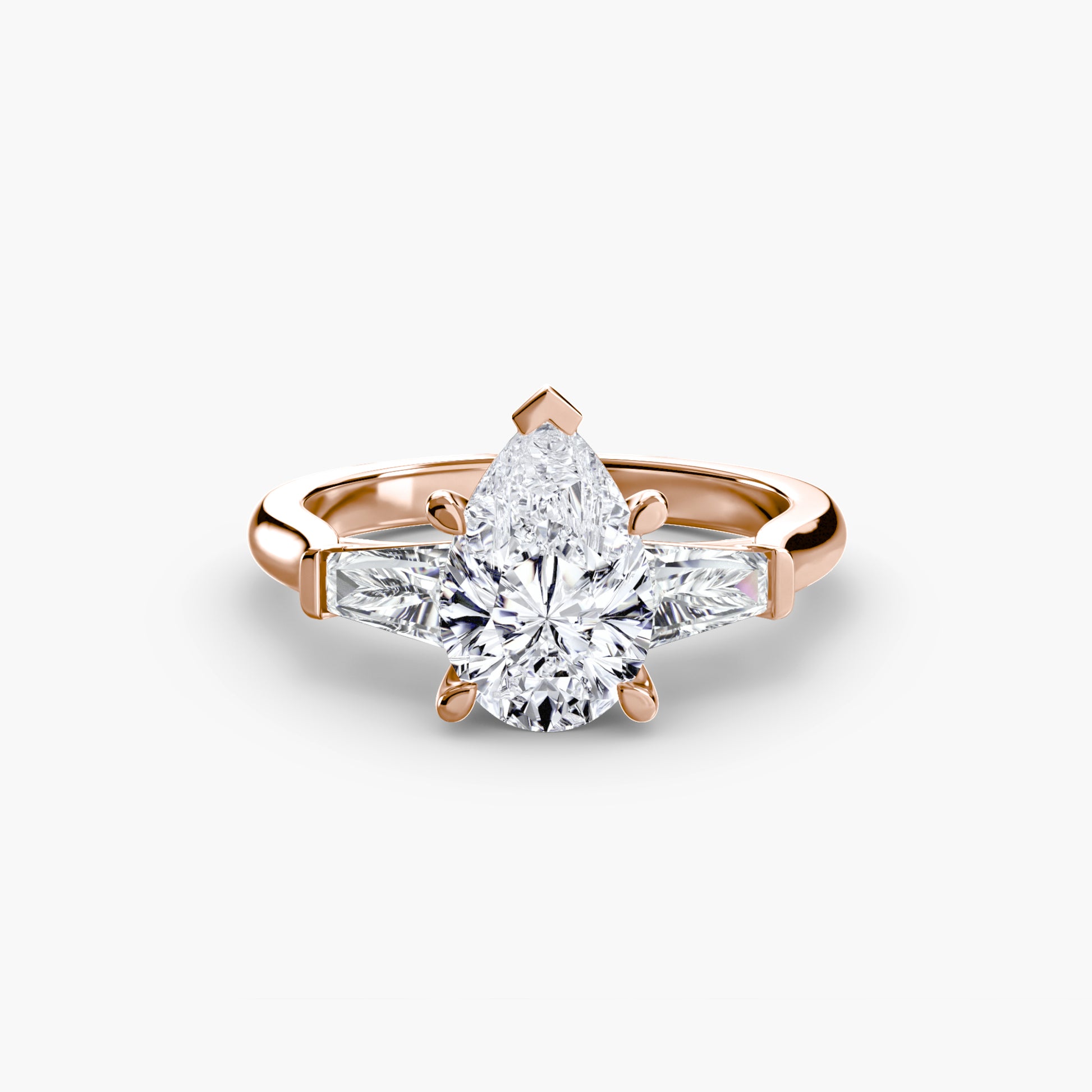 Bague trilogie (pierres latérales baguette)