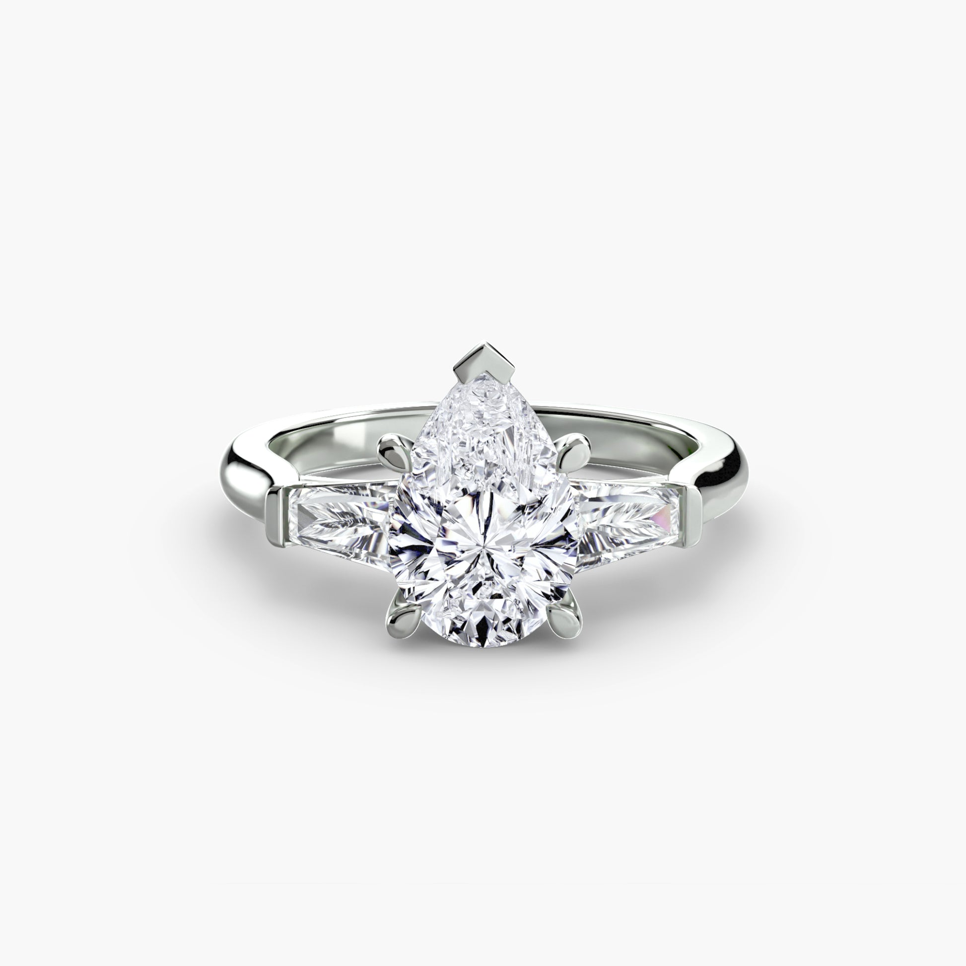 Bague trilogie (pierres latérales baguette)