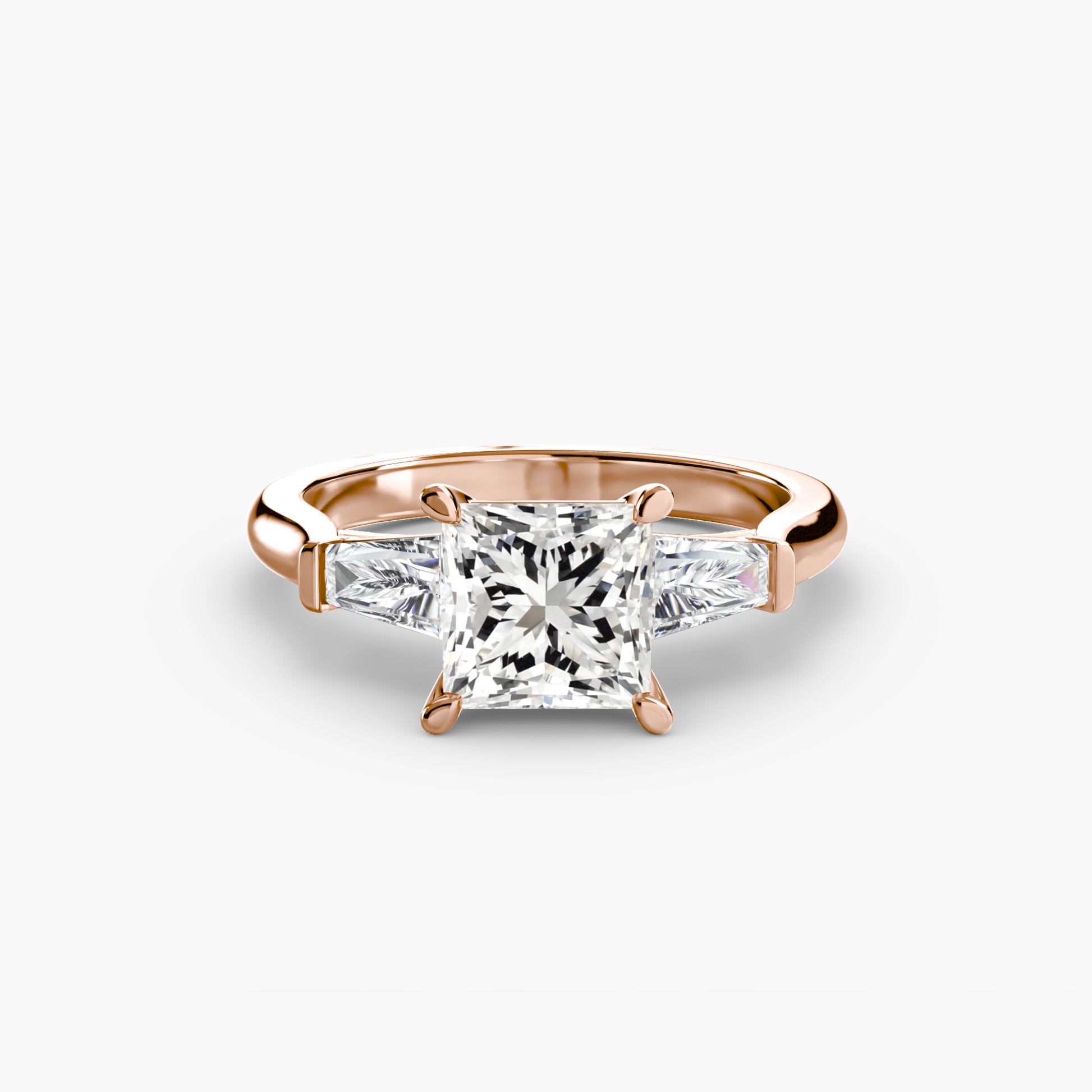 Bague trilogie (pierres latérales baguette)