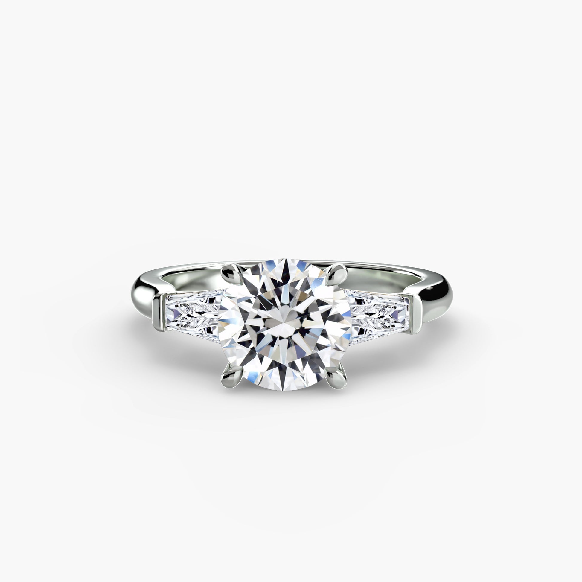 Bague trilogie (pierres latérales baguette)