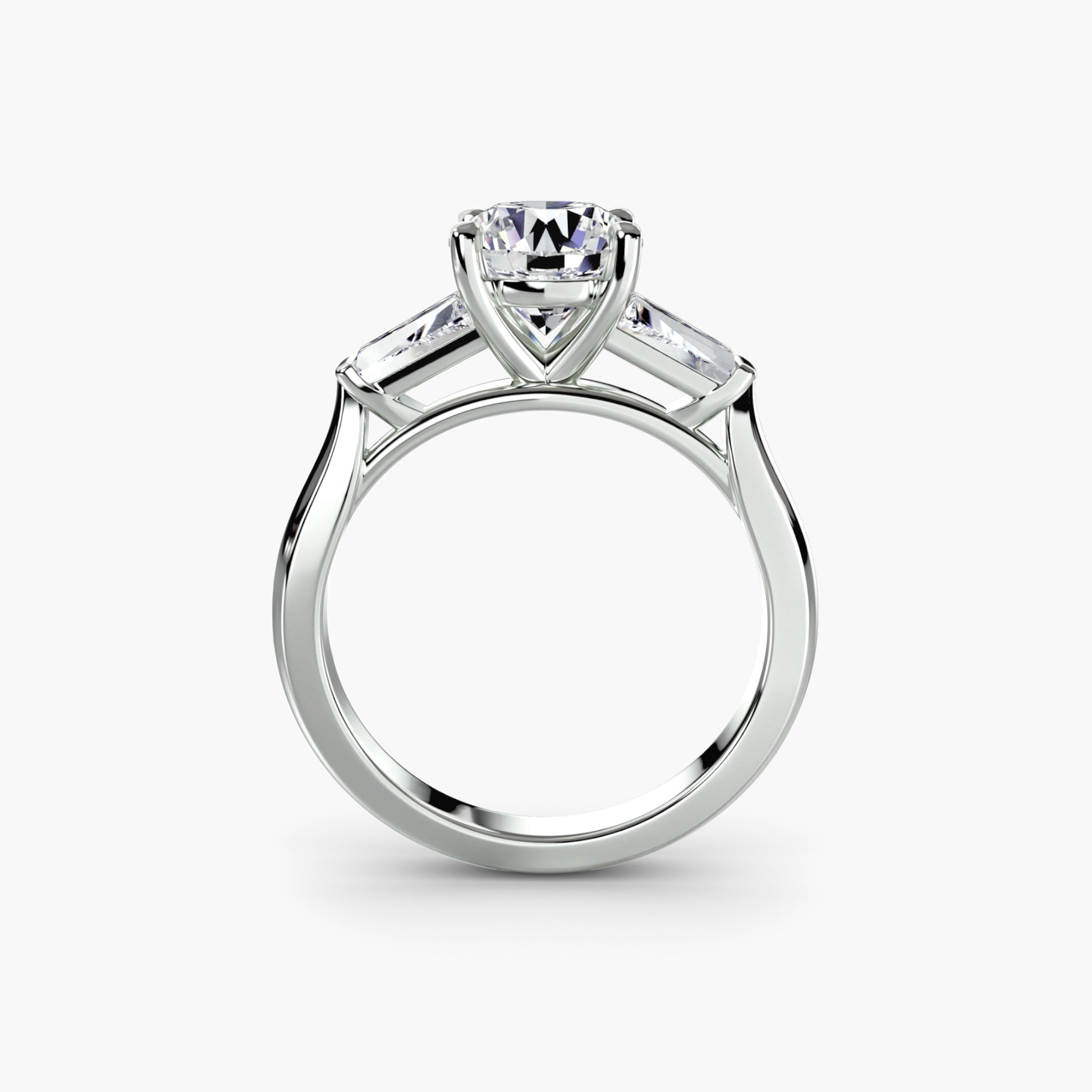 Bague trilogie (pierres latérales baguette)