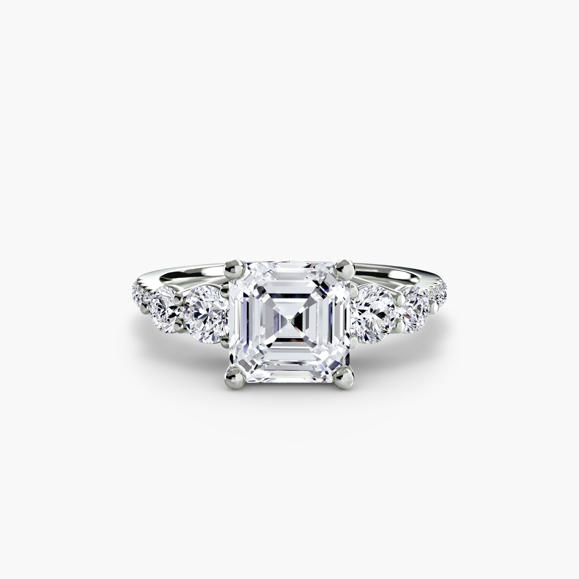 Bague cinq pierres avec anneau pavé