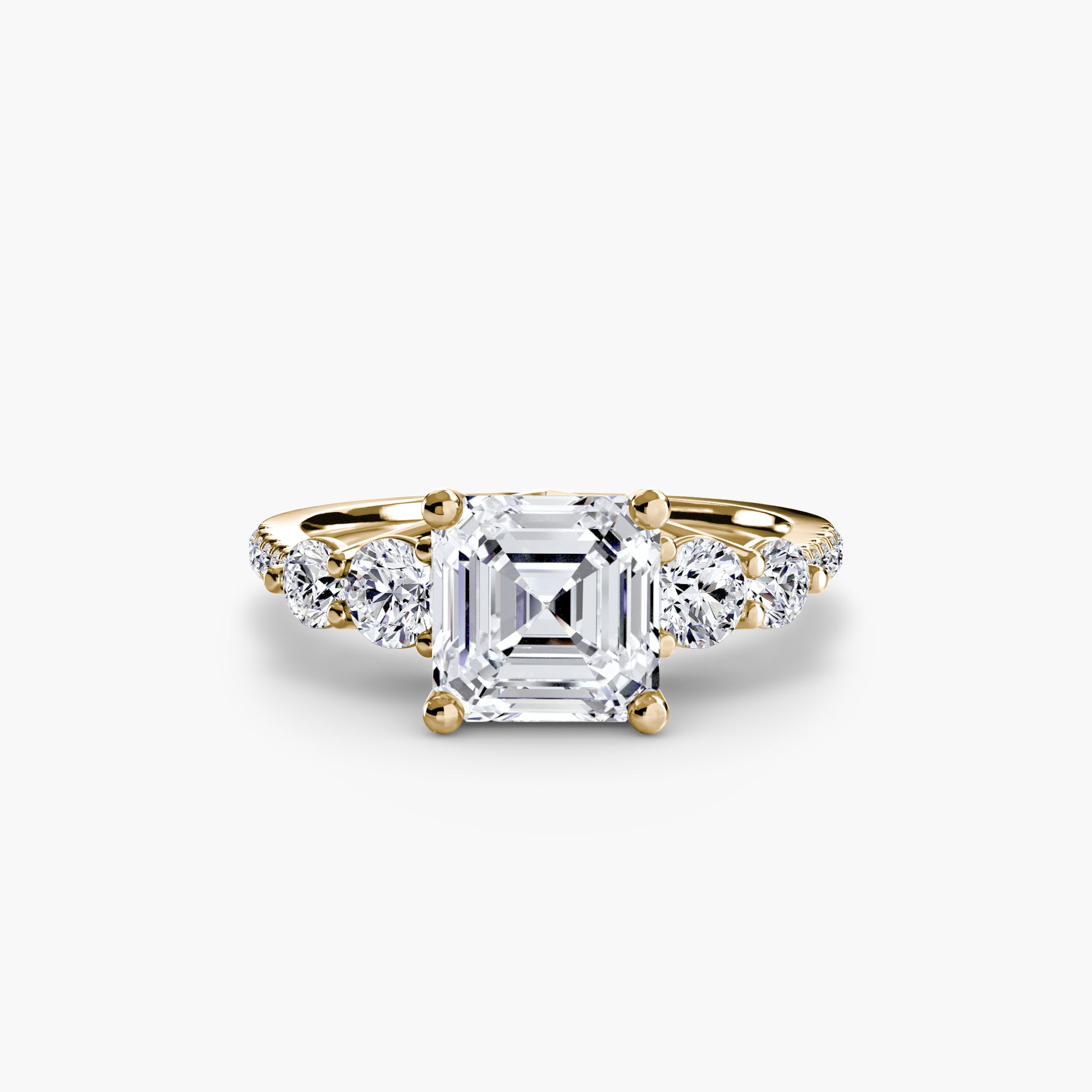 Bague cinq pierres avec anneau pavé