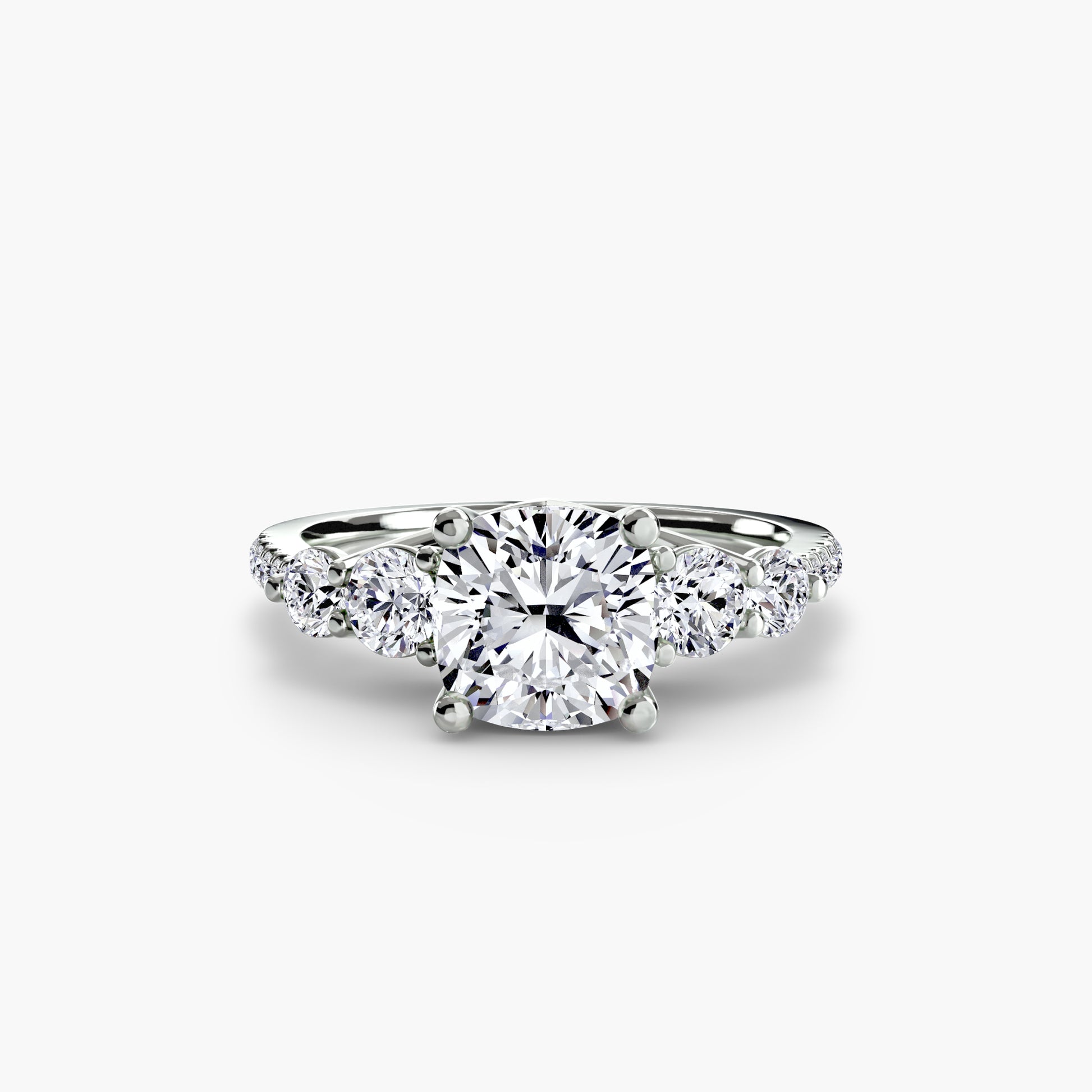 Bague cinq pierres avec anneau pavé