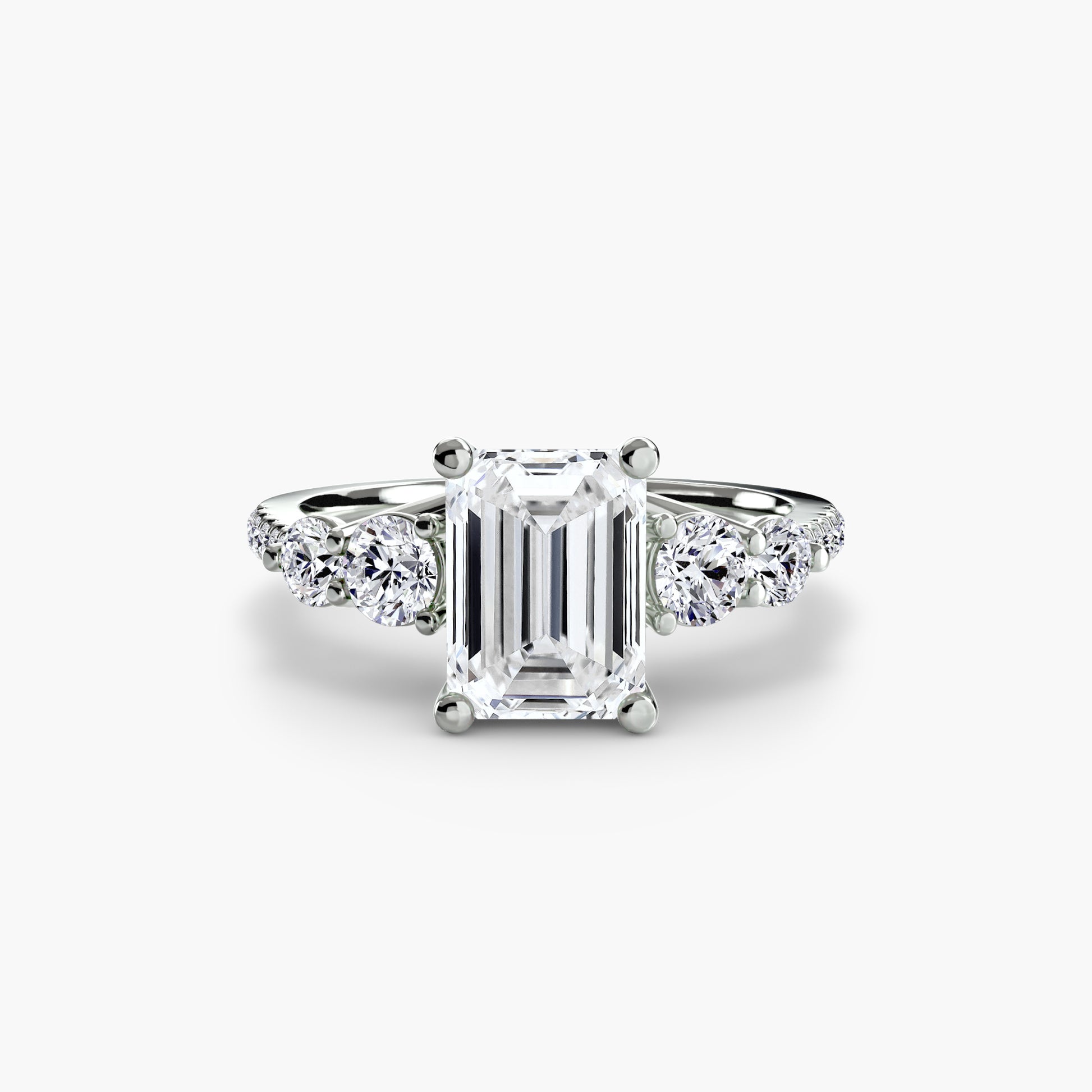 Bague cinq pierres avec anneau pavé
