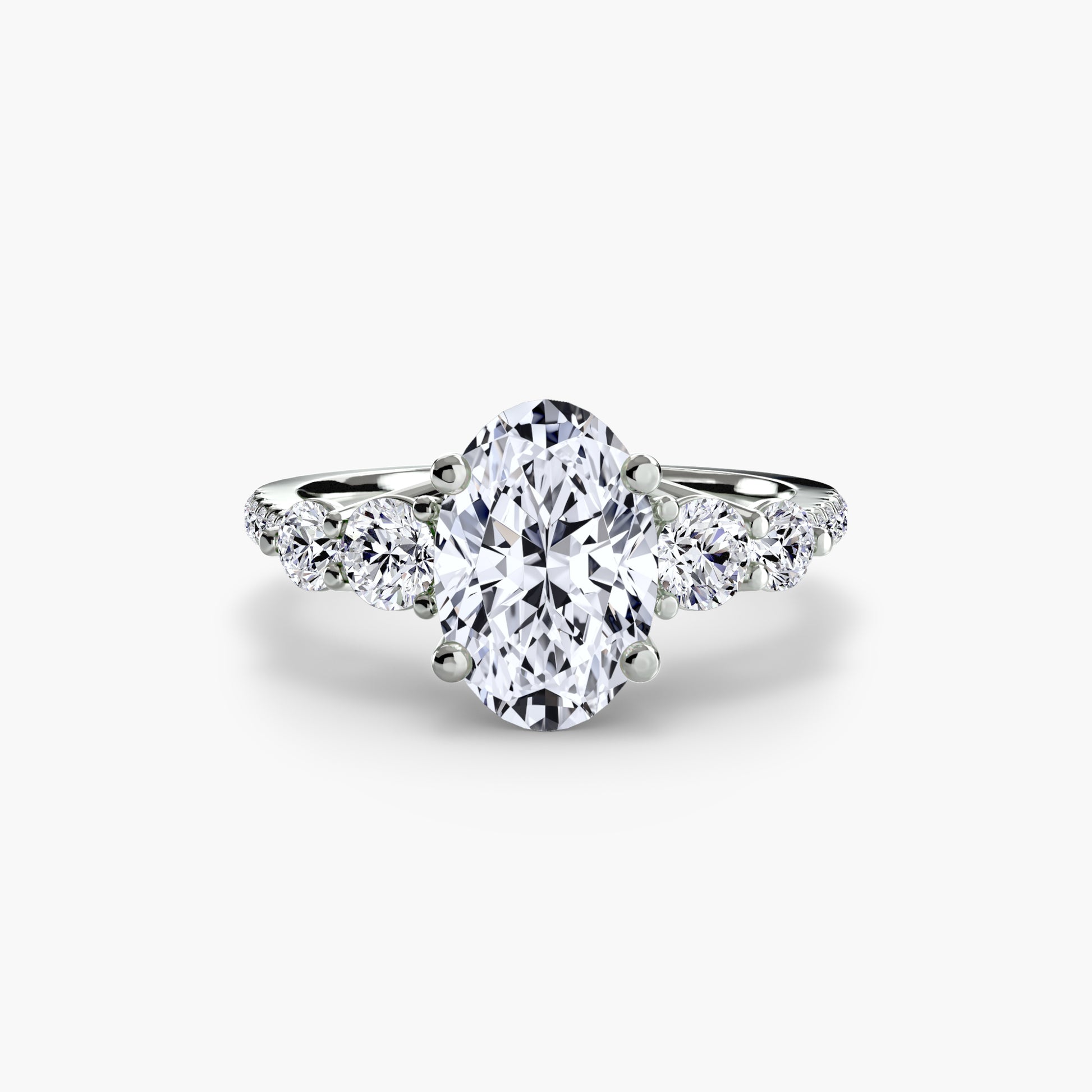 Bague cinq pierres avec anneau pavé