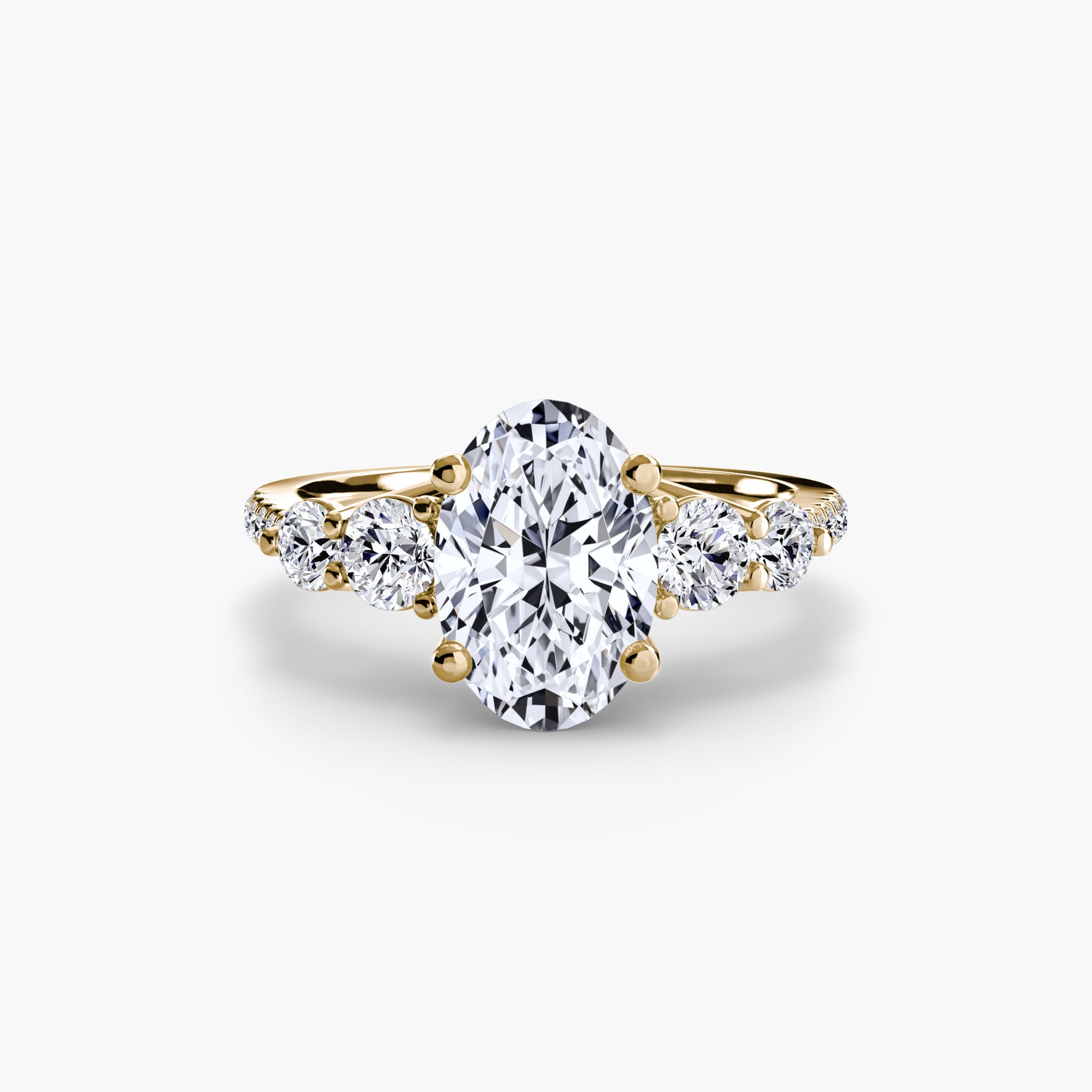 Bague cinq pierres avec anneau pavé