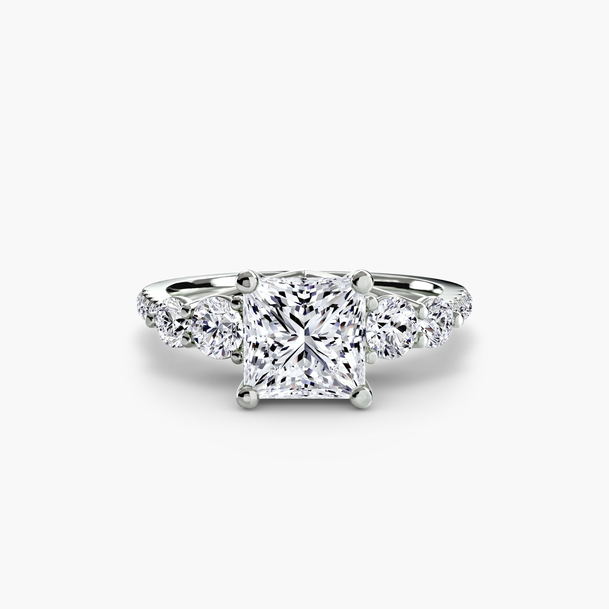 Bague cinq pierres avec anneau pavé