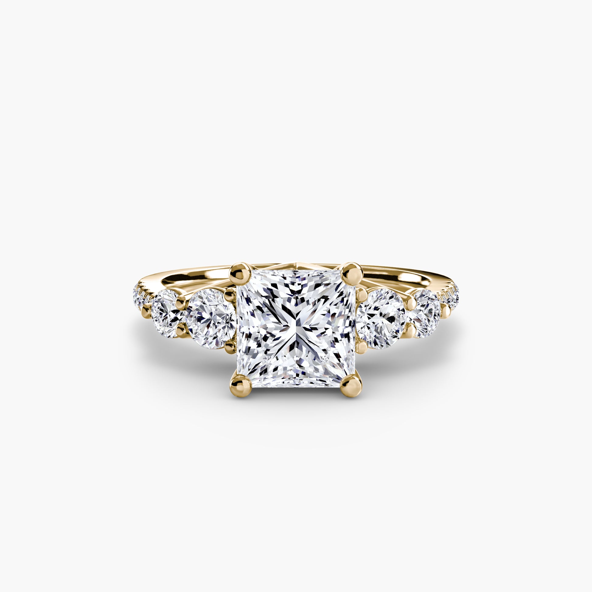 Bague cinq pierres avec anneau pavé