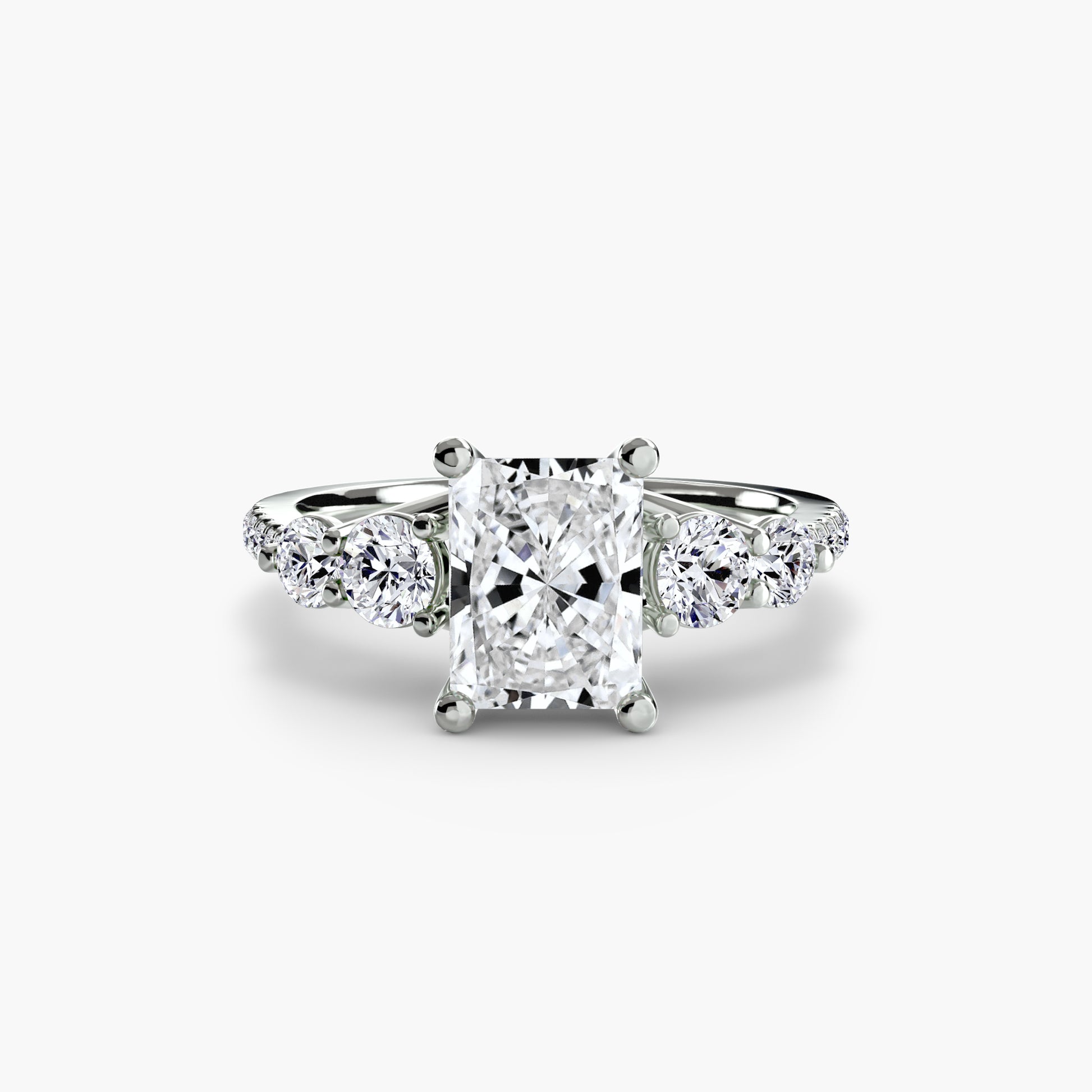 Bague cinq pierres avec anneau pavé