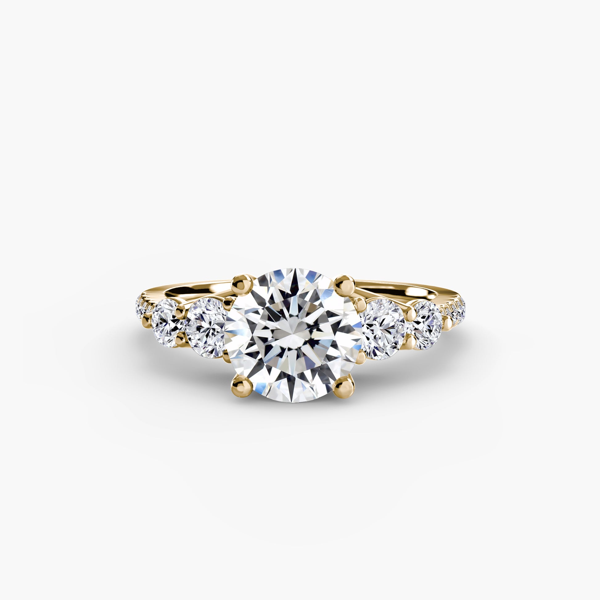 Bague cinq pierres avec anneau pavé