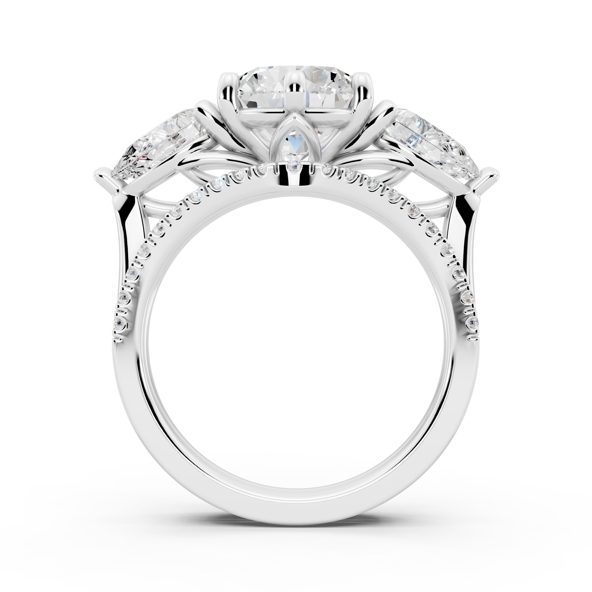 Three stone Ring with Pear shape sides and matching wedding ring.