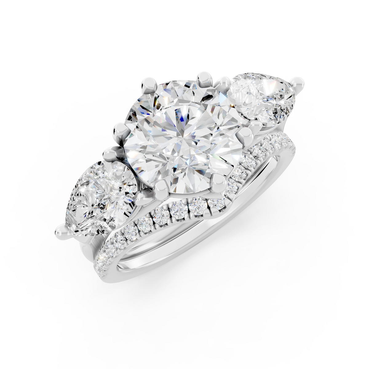 Three stone Ring with Pear shape sides and matching wedding ring.