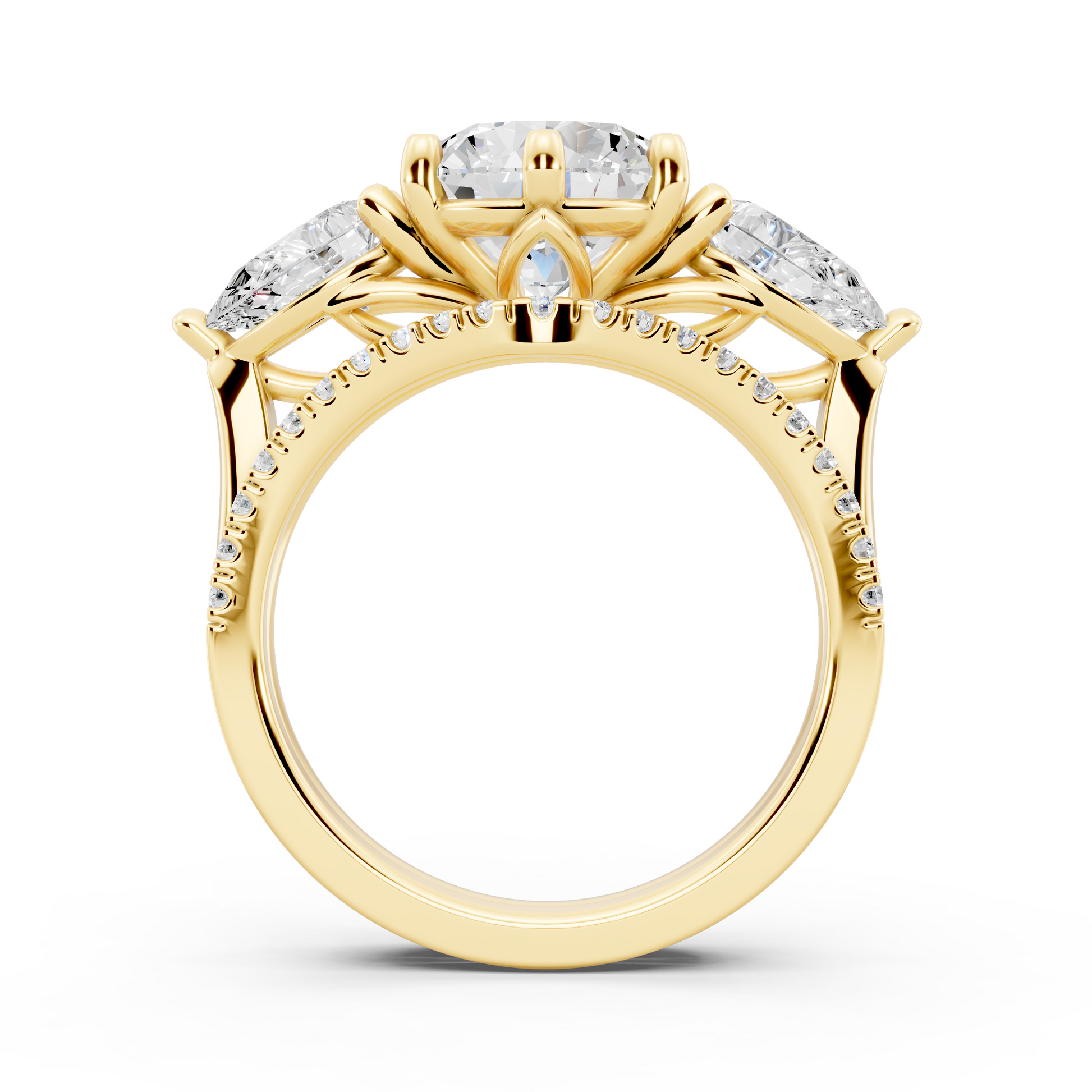 Three stone Ring with Pear shape sides and matching wedding ring.