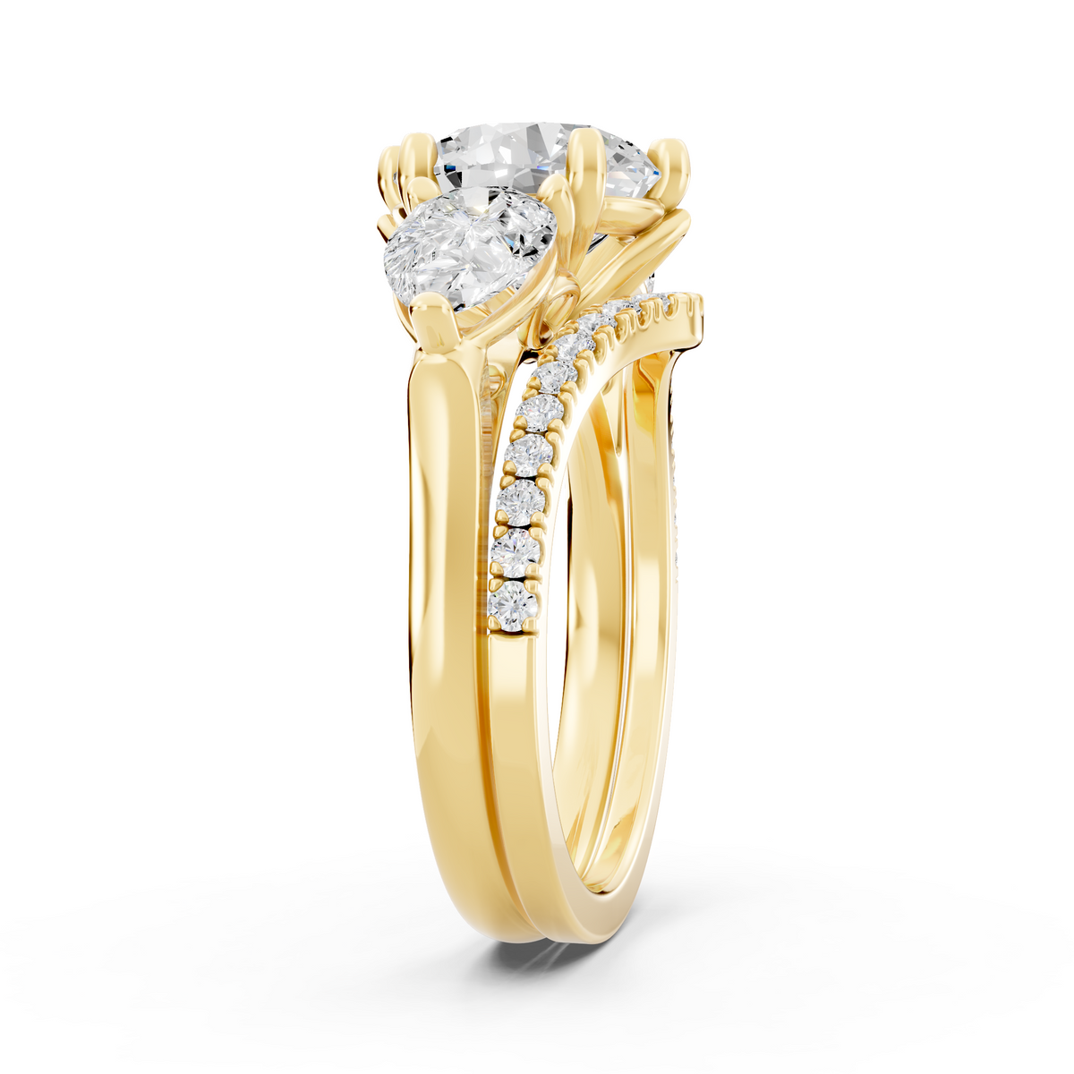 Three stone Ring with Pear shape sides and matching wedding ring.