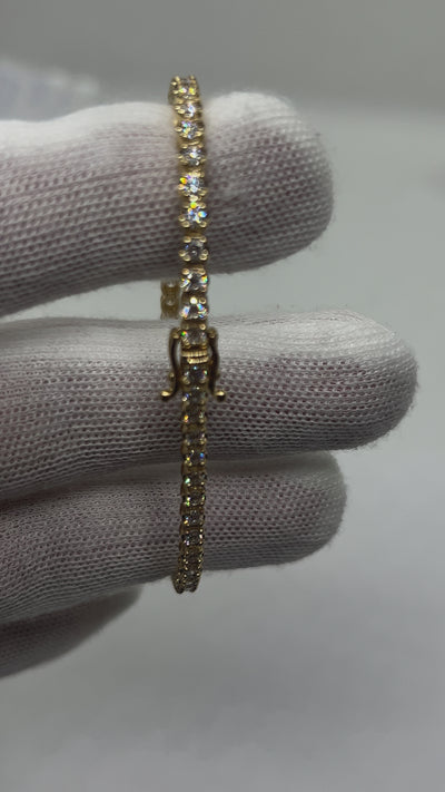 14k Gold Tennis bracelet 5pts