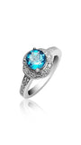 Bague de fiançailles Halo avec topaze bleue