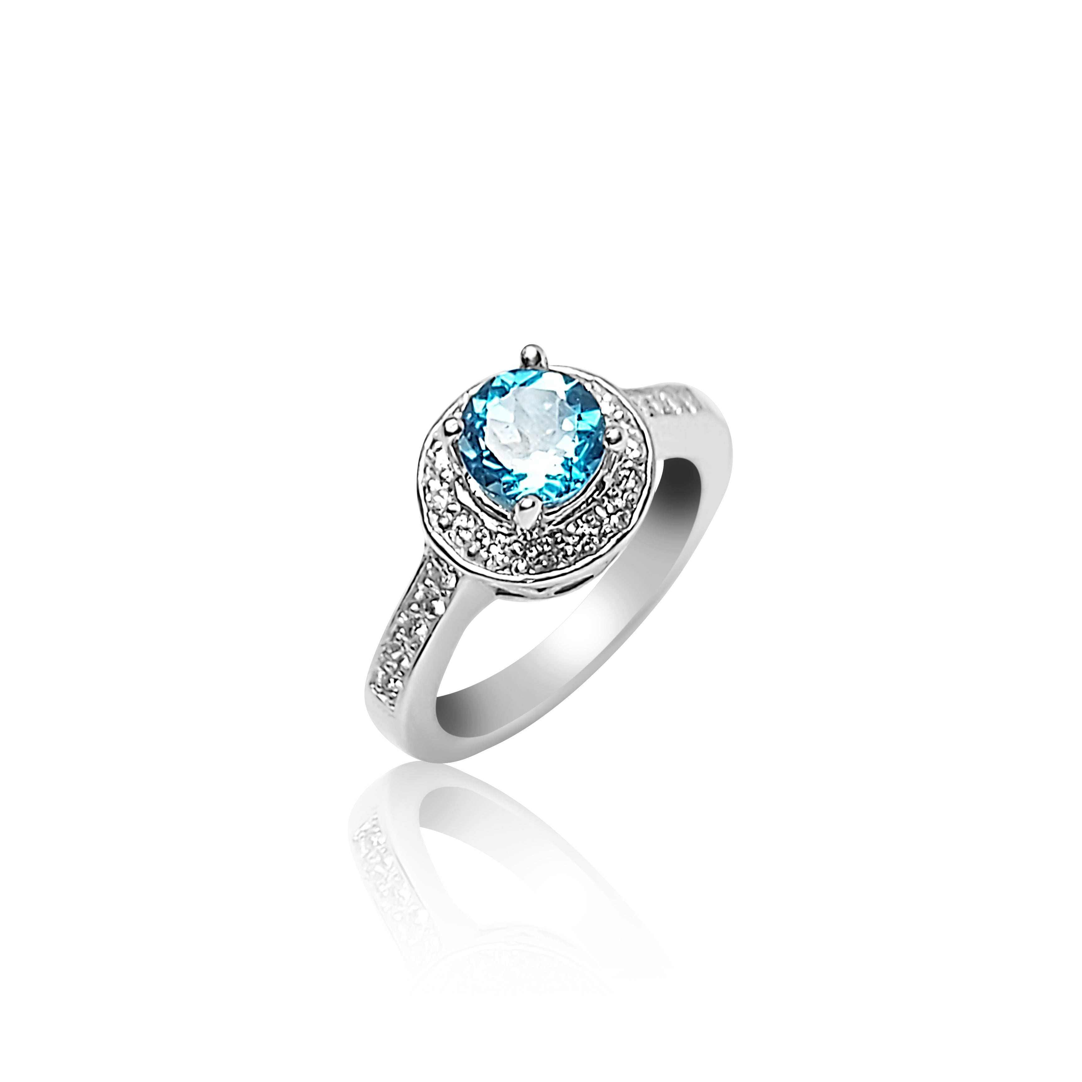 Bague de fiançailles auréole avec topaze bleue