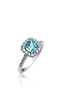 Bague de fiançailles auréole avec topaze bleue taille coussin