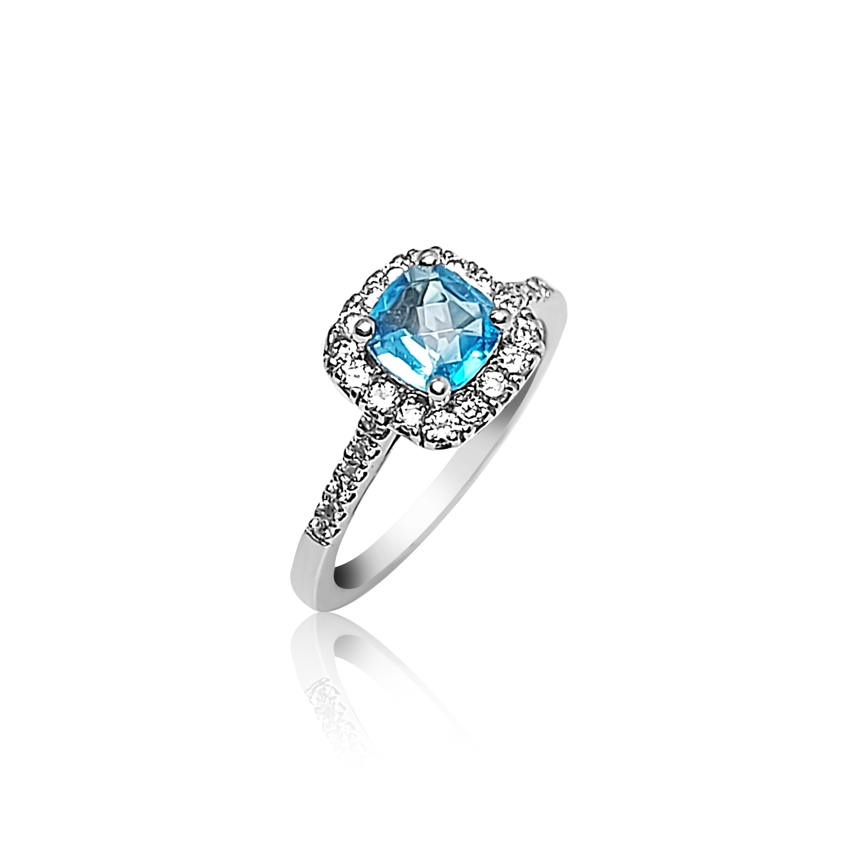 Bague de fiançailles auréole avec topaze bleue taille coussin