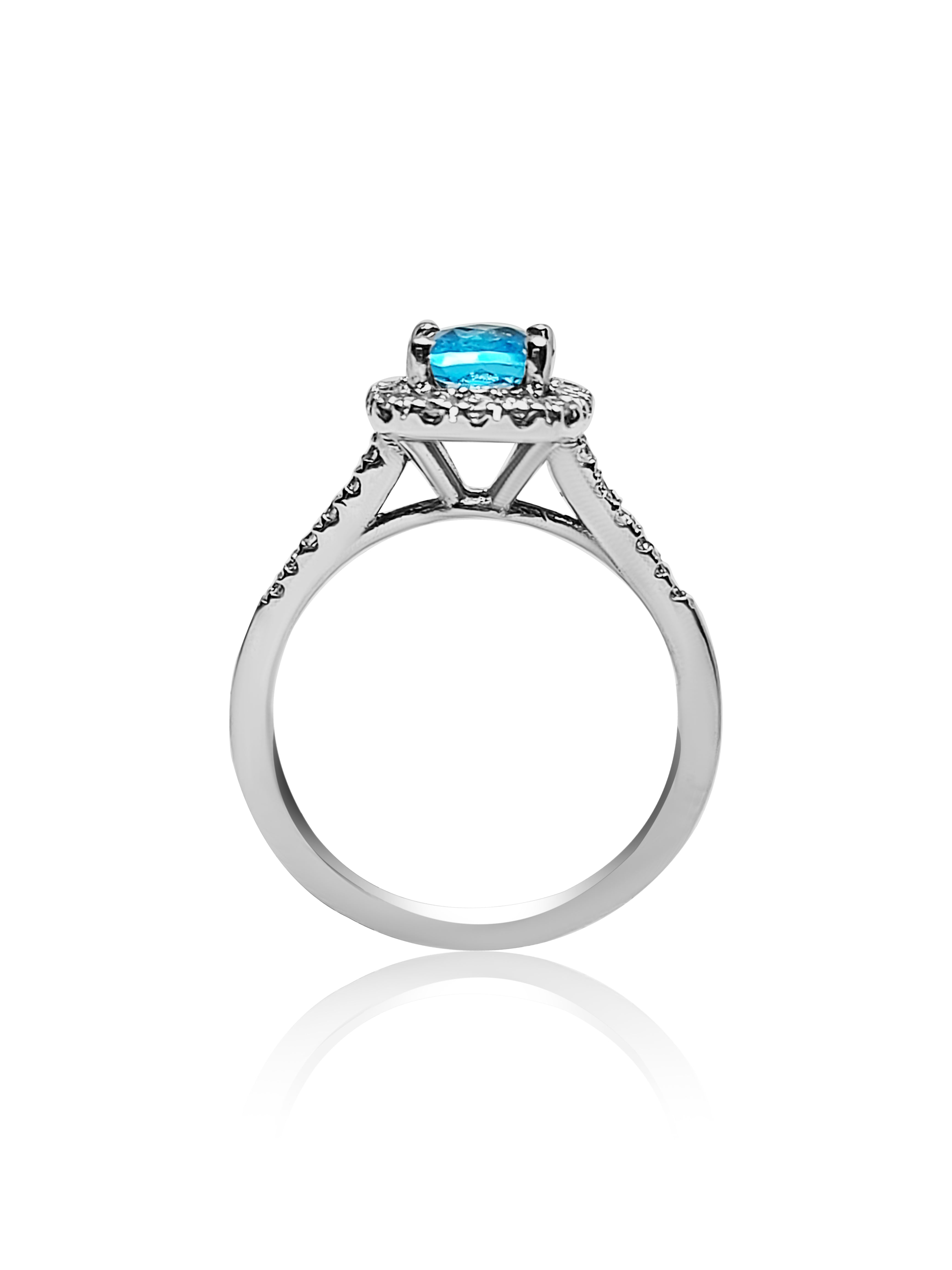 Halo Engagement Ring with Blue Topaz cushion cut stone