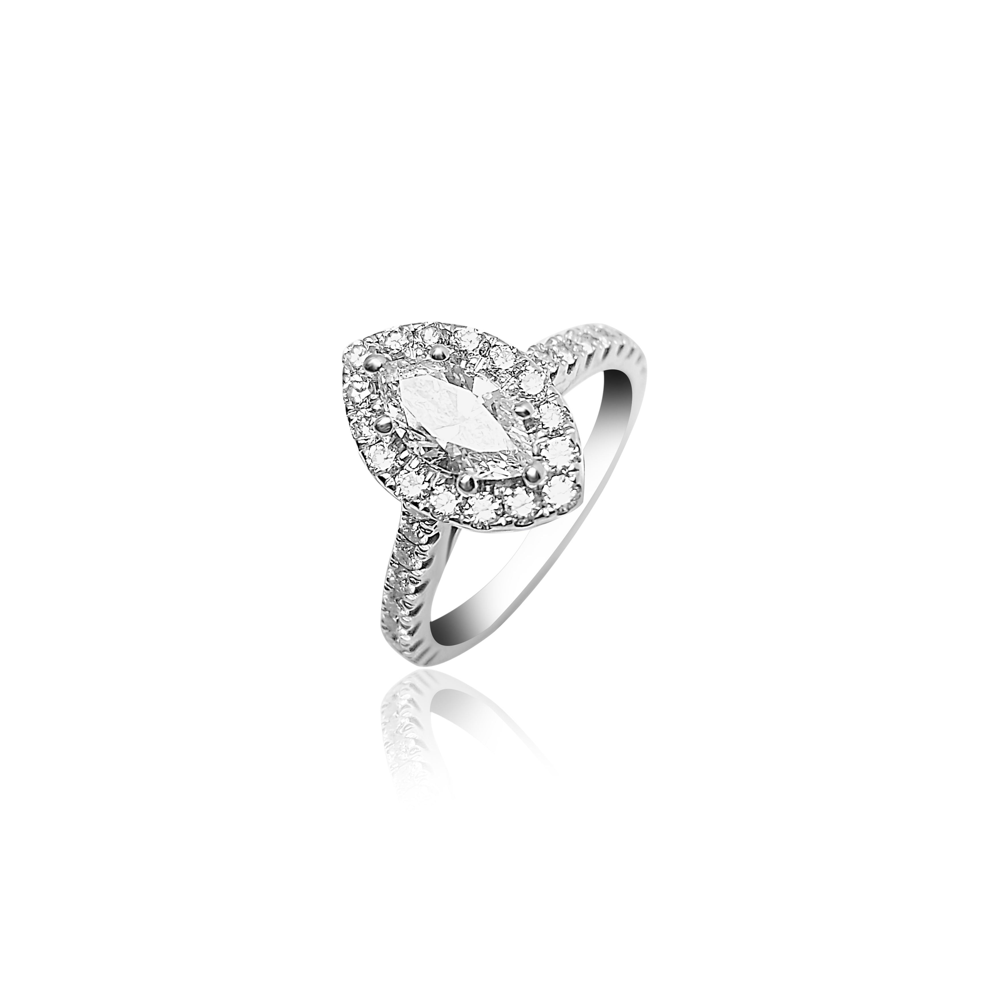 Titled 18k white gold engagement ring with a marquise-cut diamond