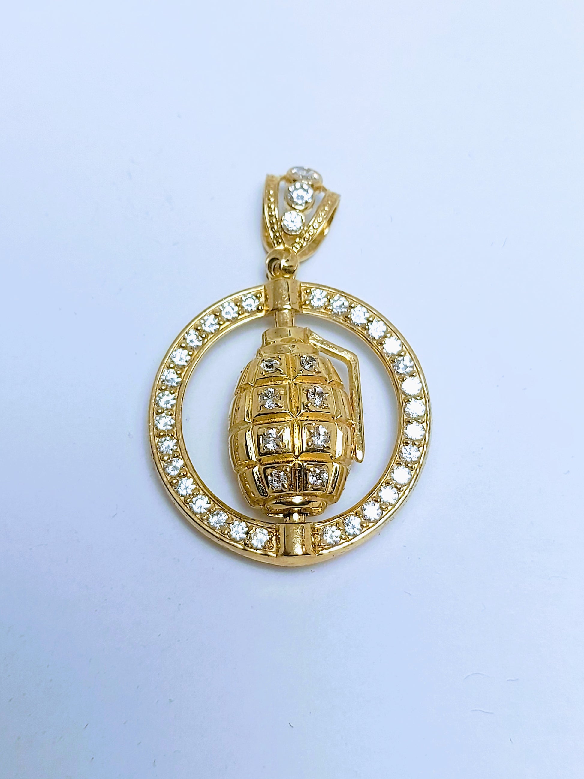 Grenade gold pendant
